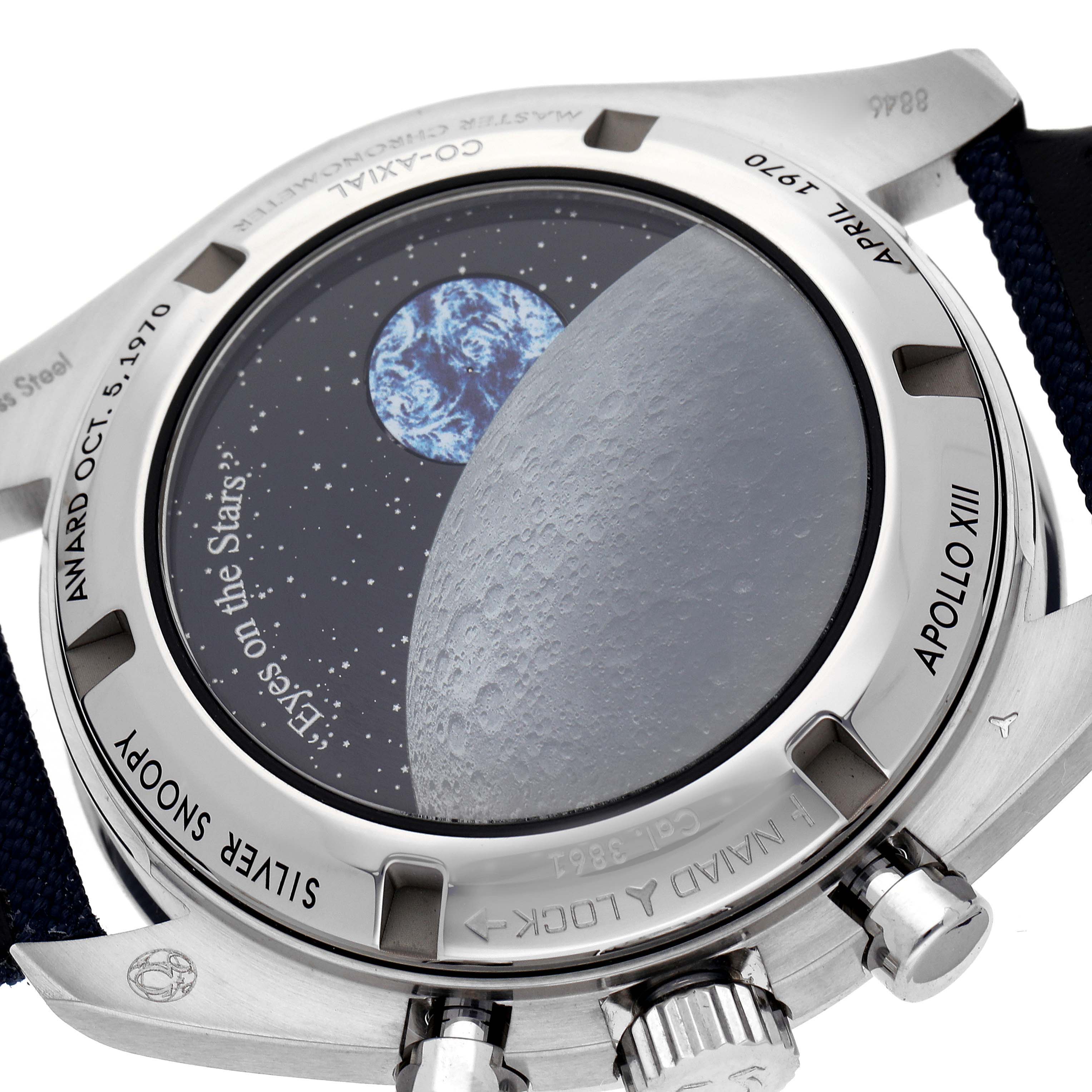 The image shows the back of an Omega Speedmaster 310.32.42.50.02.001 Men's Stainless Steel Silver Dial 310.32.42.50.02.001 Men's Stainless Steel Silver Dial watch featuring an engraving related to Apollo XIII.