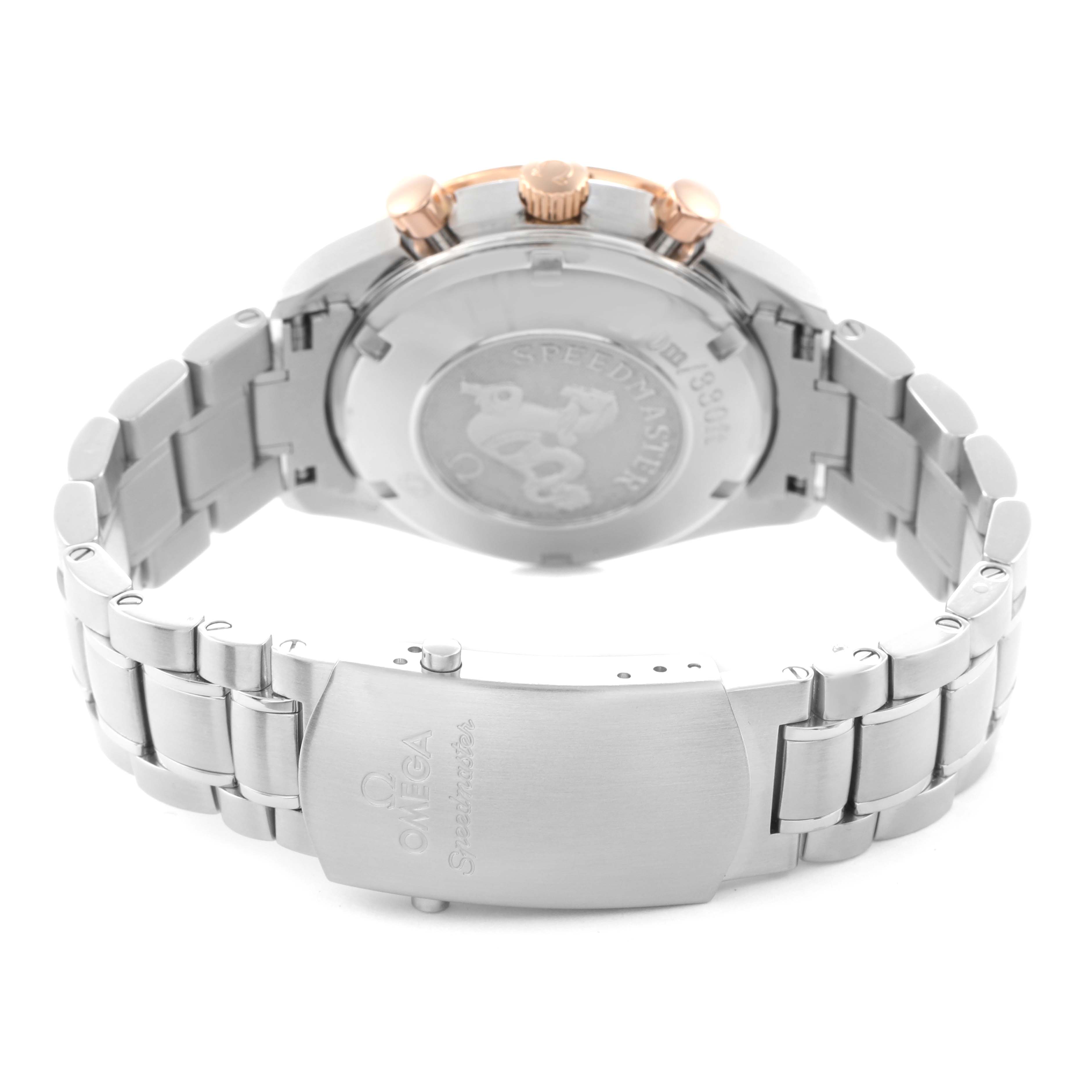 The Omega Speedmaster 323.21.40.40.01.001 Men
s Steel and Gold (two tone) Black Dial 323.21.40.40.01.001 Men
s Steel and Gold (two tone) Black Dial watch is shown from the back, highlighting the bracelet, clasp, and case back with branding.