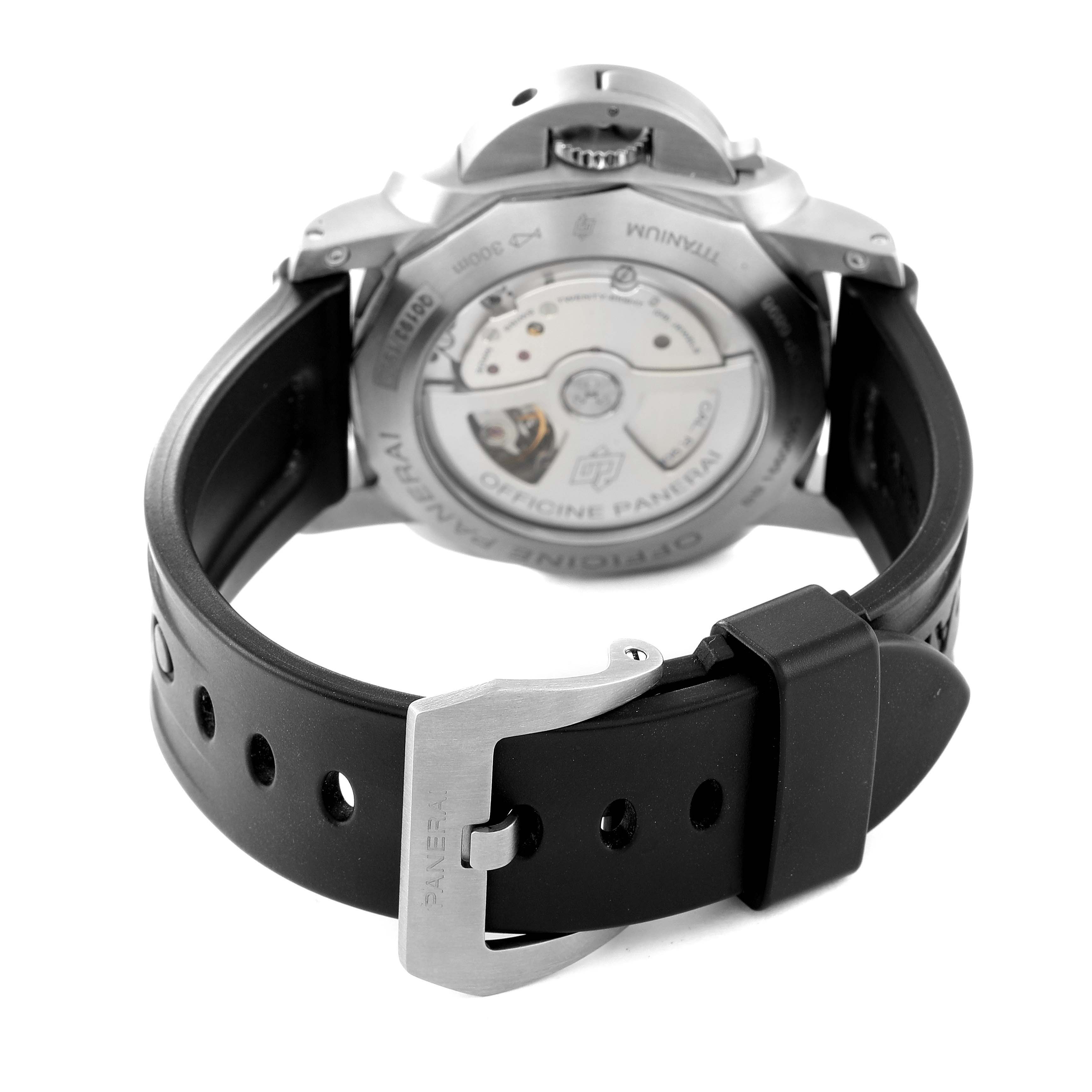 The image shows the back view of a Panerai Luminor PAM00351 Men's Titanium Brown Dial PAM00351 Men's Titanium Brown Dial watch, highlighting its transparent case back and the buckle of the black strap.