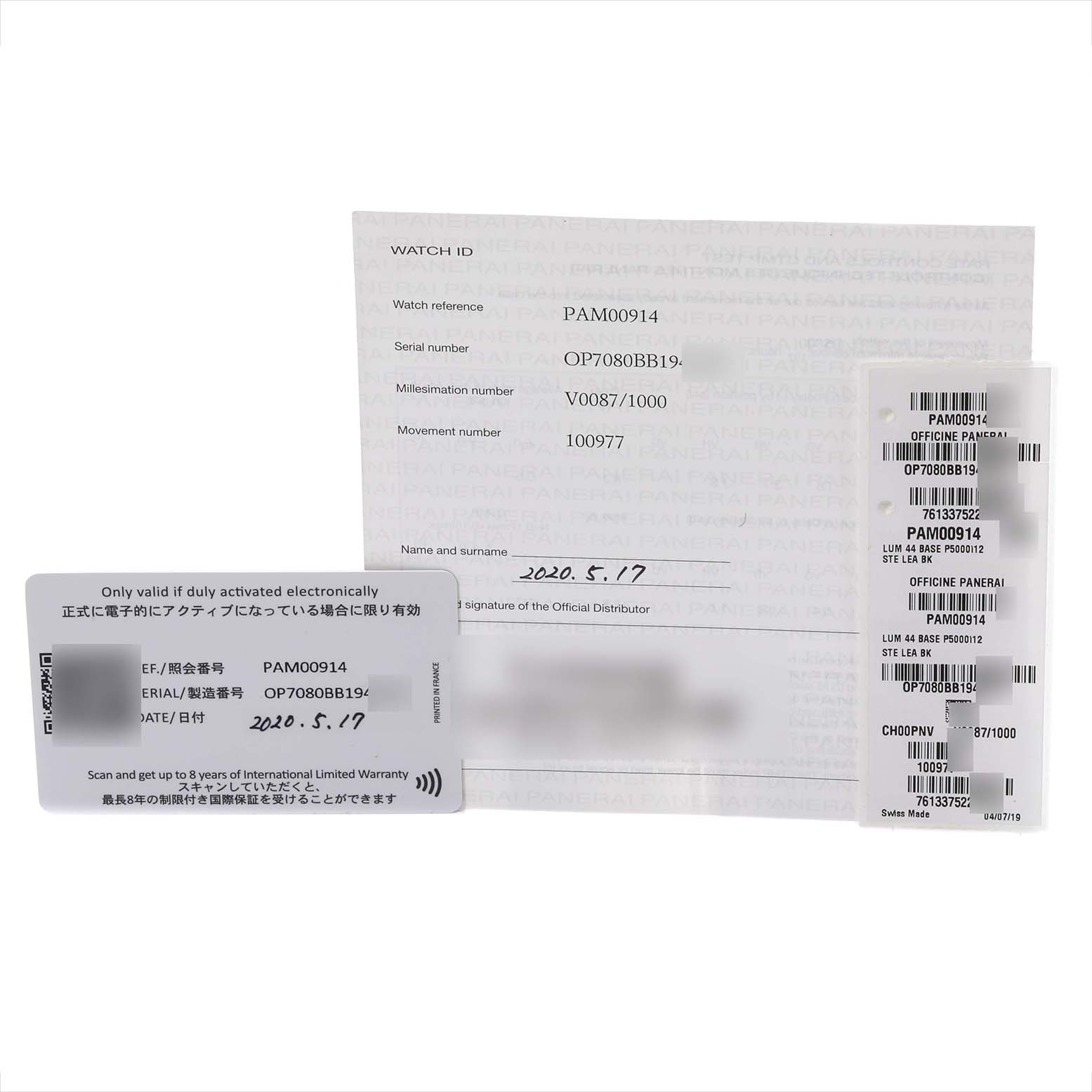 This image shows the warranty card, certification, and identification tags for the Panerai Luminor PAM00914 Men's Stainless Steel Black Dial PAM00914 Men's Stainless Steel Black Dial model PAM00914.