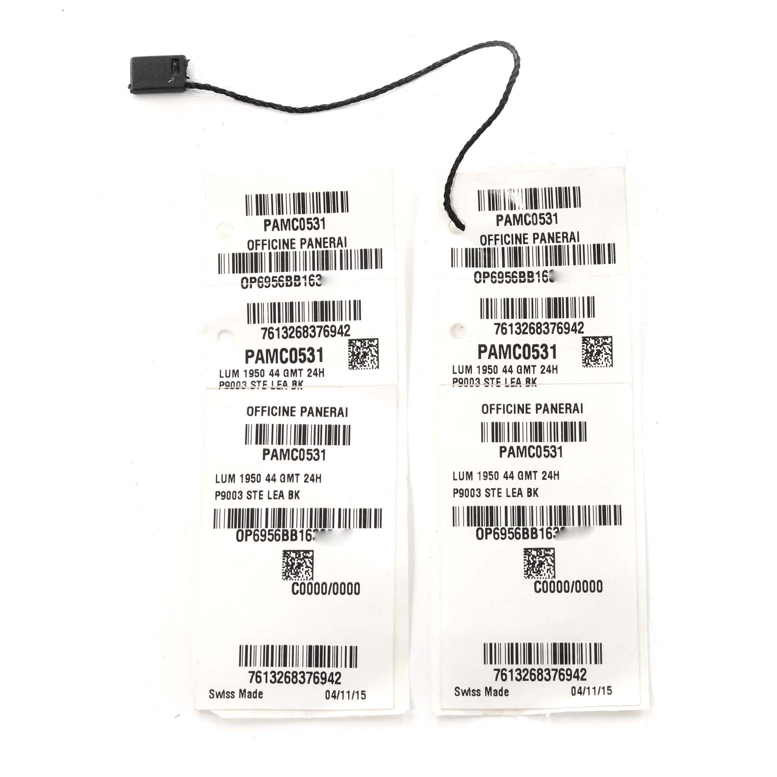 This image shows two Panerai Luminor PAM00531 Men
s Stainless Steel Black Dial PAM00531 Men
s Stainless Steel Black Dial model PAMC0531 tags with barcodes and identification details from an overhead angle.