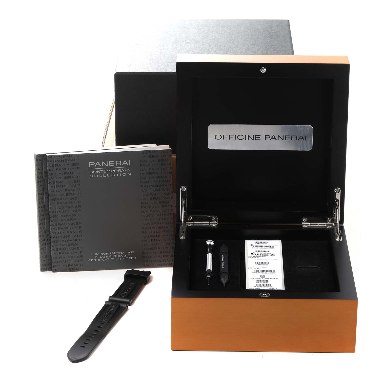 This image shows an opened Panerai Luminor PAM00359 Men
s Stainless Steel Black Dial PAM00359 Men
s Stainless Steel Black Dial watch box with accessories, an extra strap, and documentation.