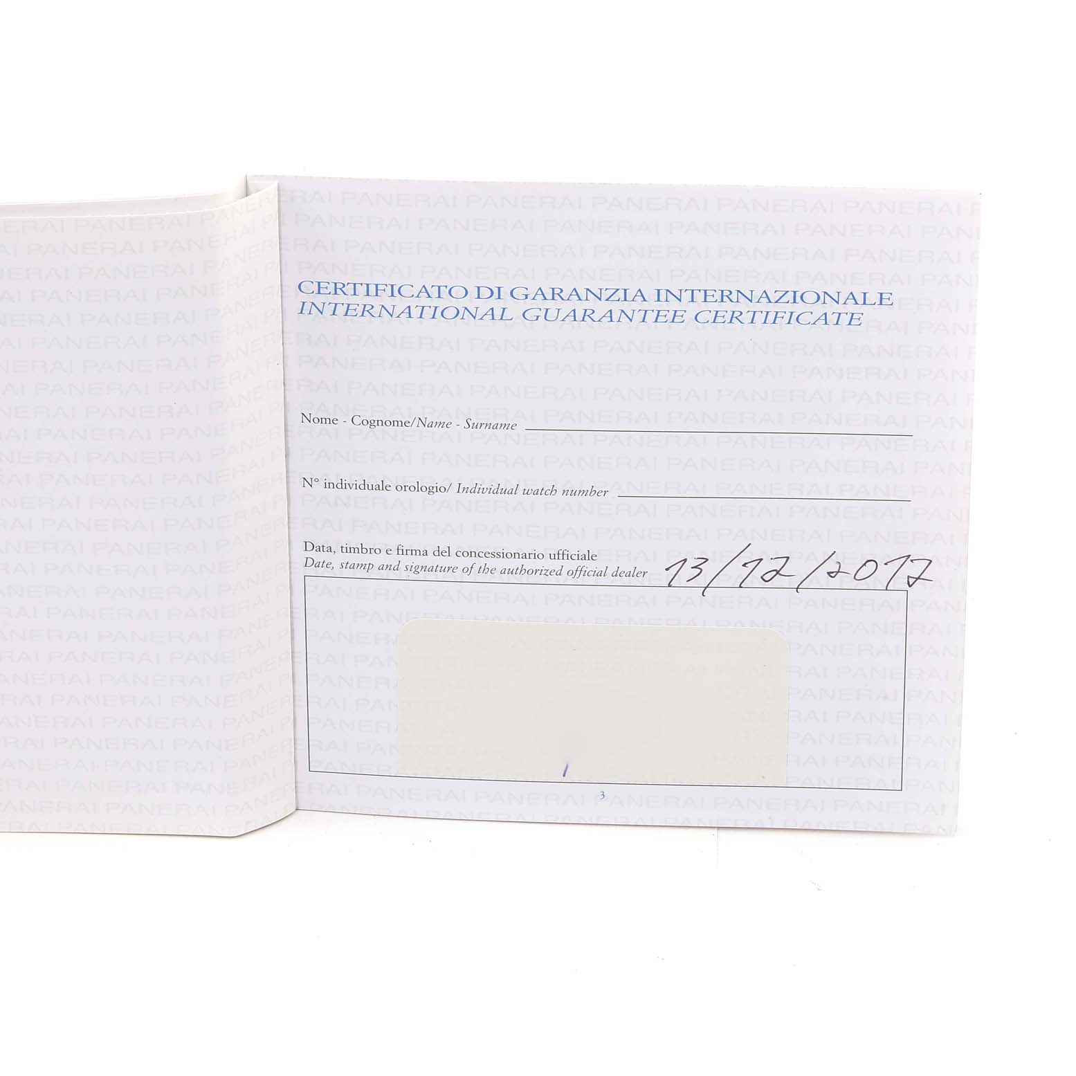 This image shows the international guarantee certificate booklet, partially open, for a Panerai Luminor PAM00359 Men
s Stainless Steel Black Dial PAM00359 Men
s Stainless Steel Black Dial model watch.