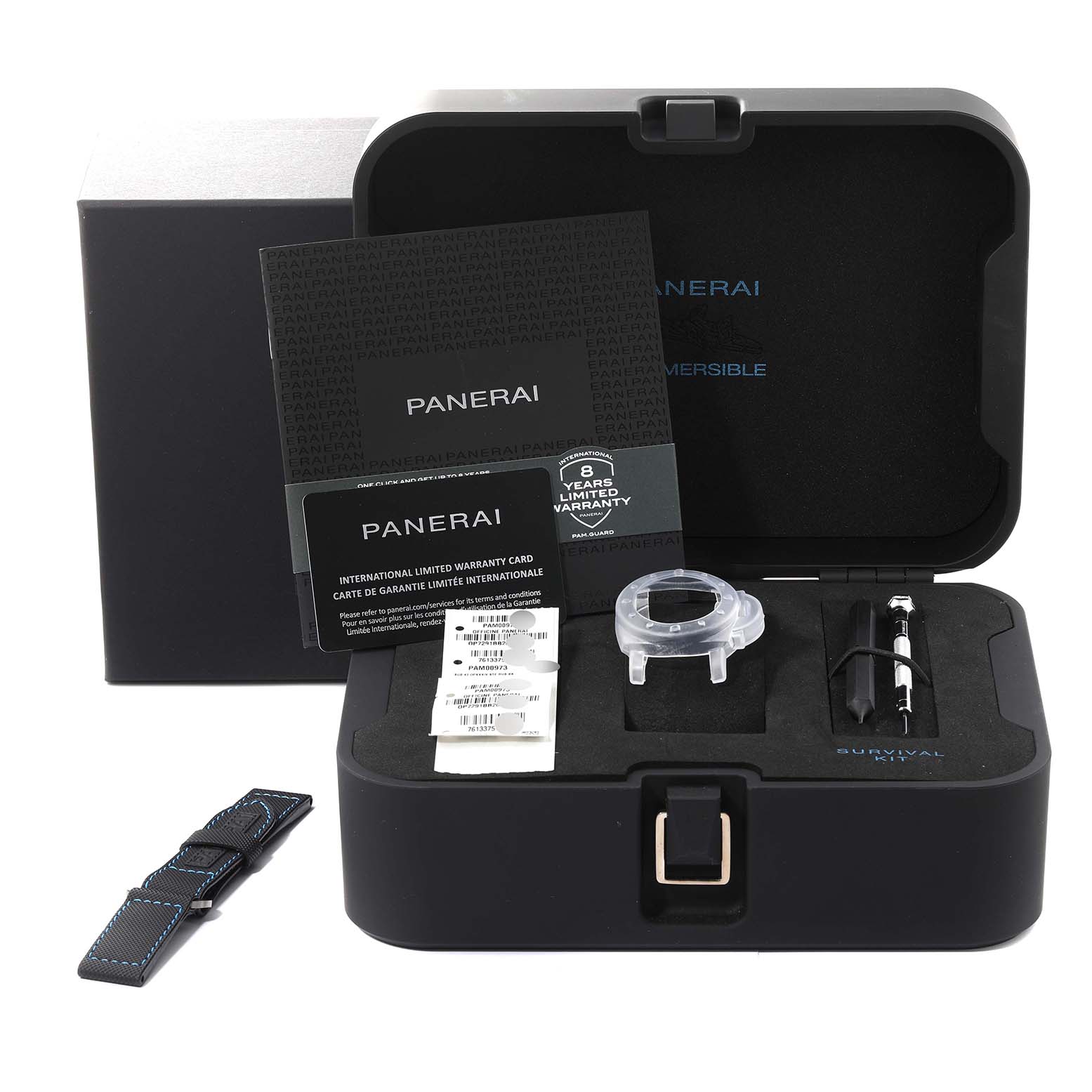 The image shows a Panerai Submersible PAM00973 Men's Stainless Steel Black Dial PAM00973 Men's Stainless Steel Black Dial watch set with warranty cards, an additional strap, and tools inside an open box.