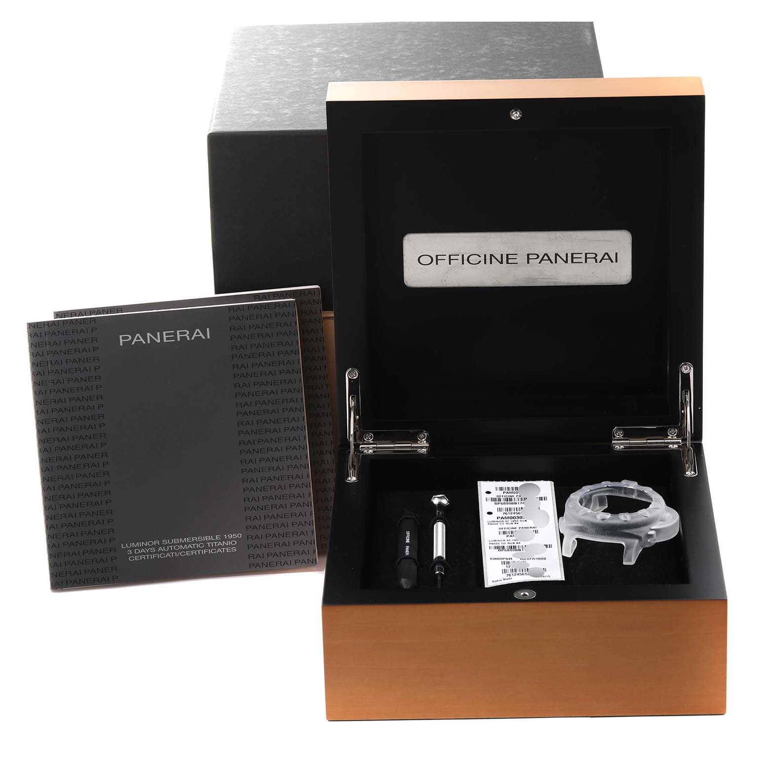 The image shows an open display box for the Panerai Submersible PAM00305 Men's Titanium Black Dial PAM00305 Men's Titanium Black Dial model, containing manuals, tools, and a protective cover.