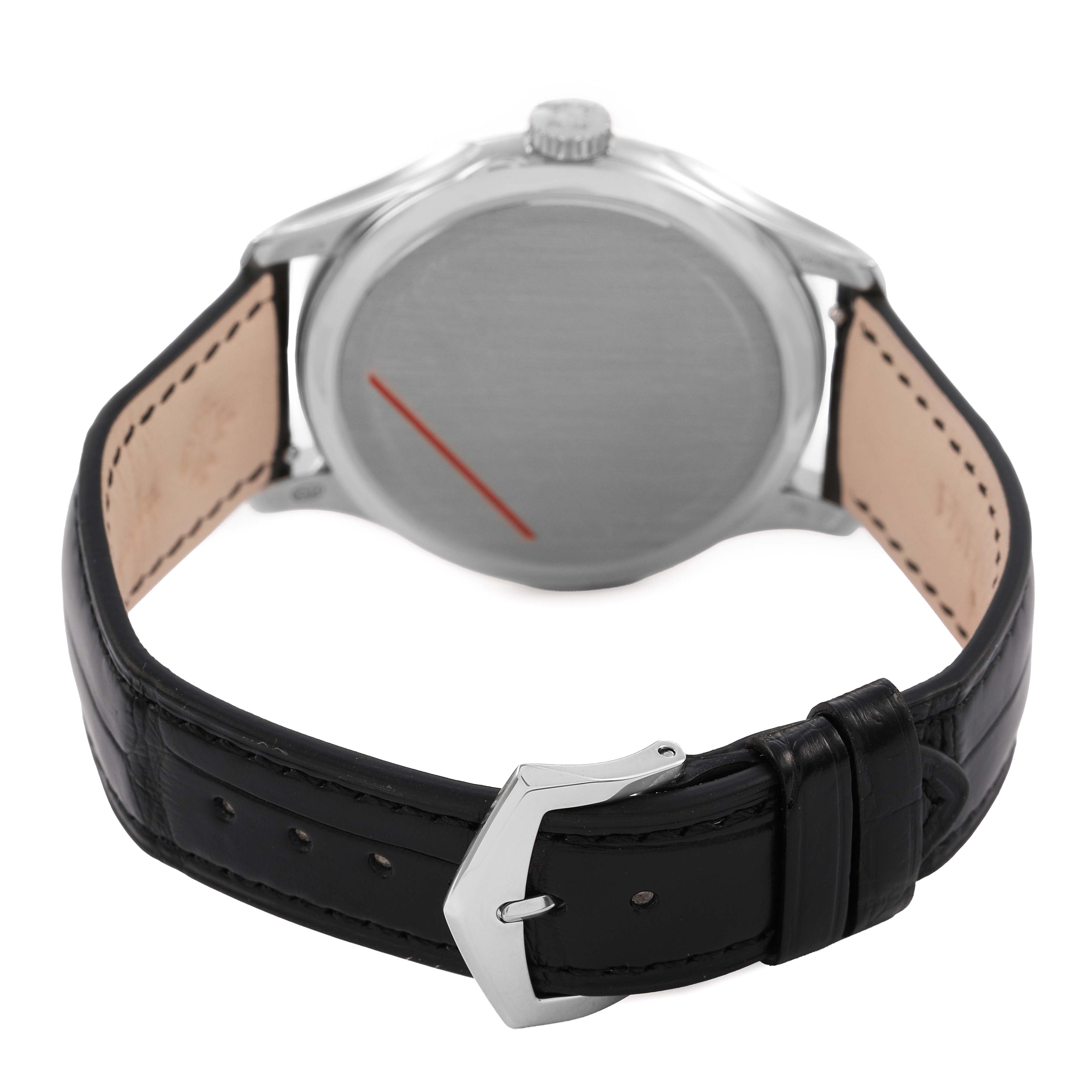 The image shows the back of a Patek Philippe Calatrava 5227G-001 Men's White Gold Beige Dial watch with its buckle, strap, and case back visible.