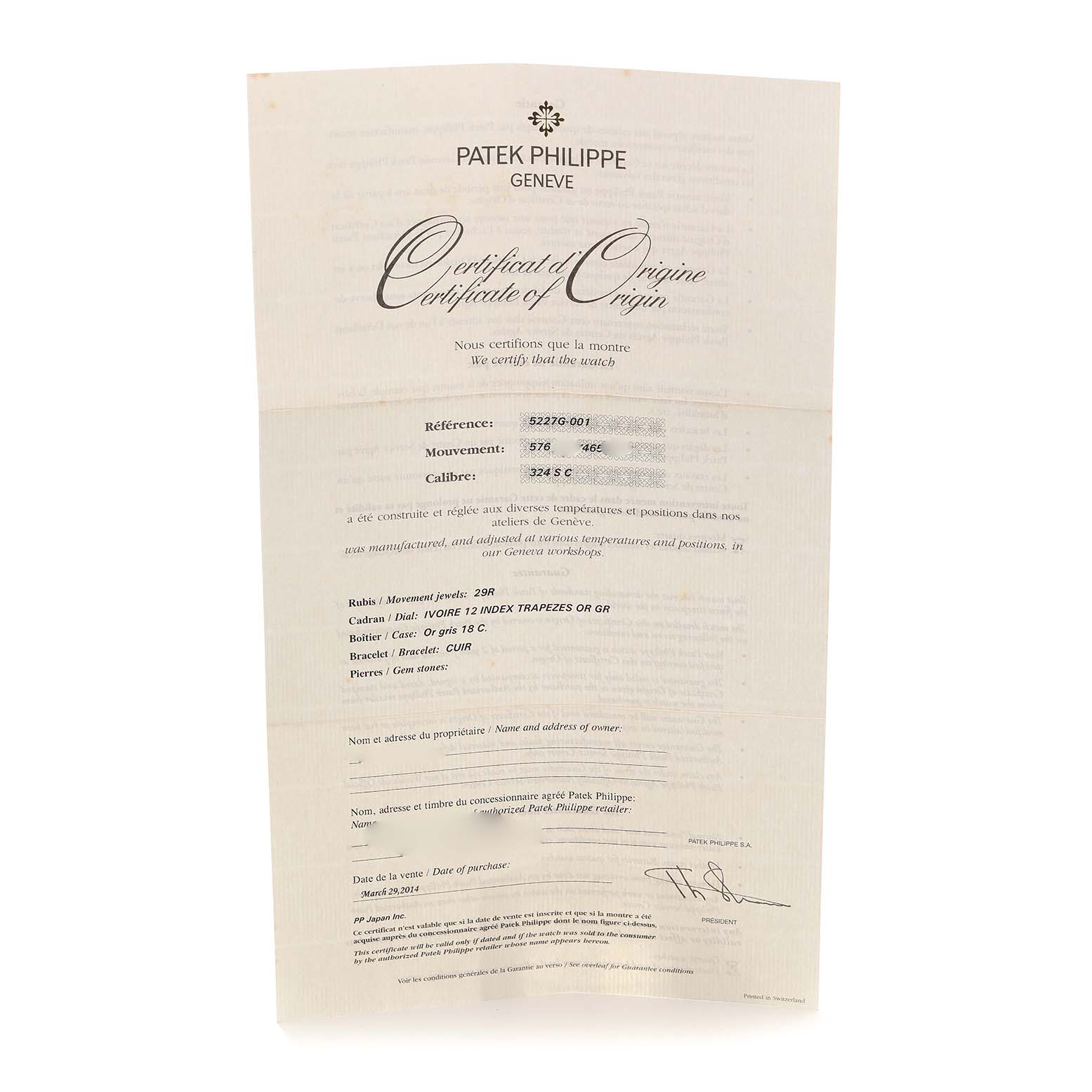 This image shows a Patek Philippe Calatrava 5227G-001 Men's White Gold Beige Dial certificate of origin, detailing the model's specifications and authenticity.