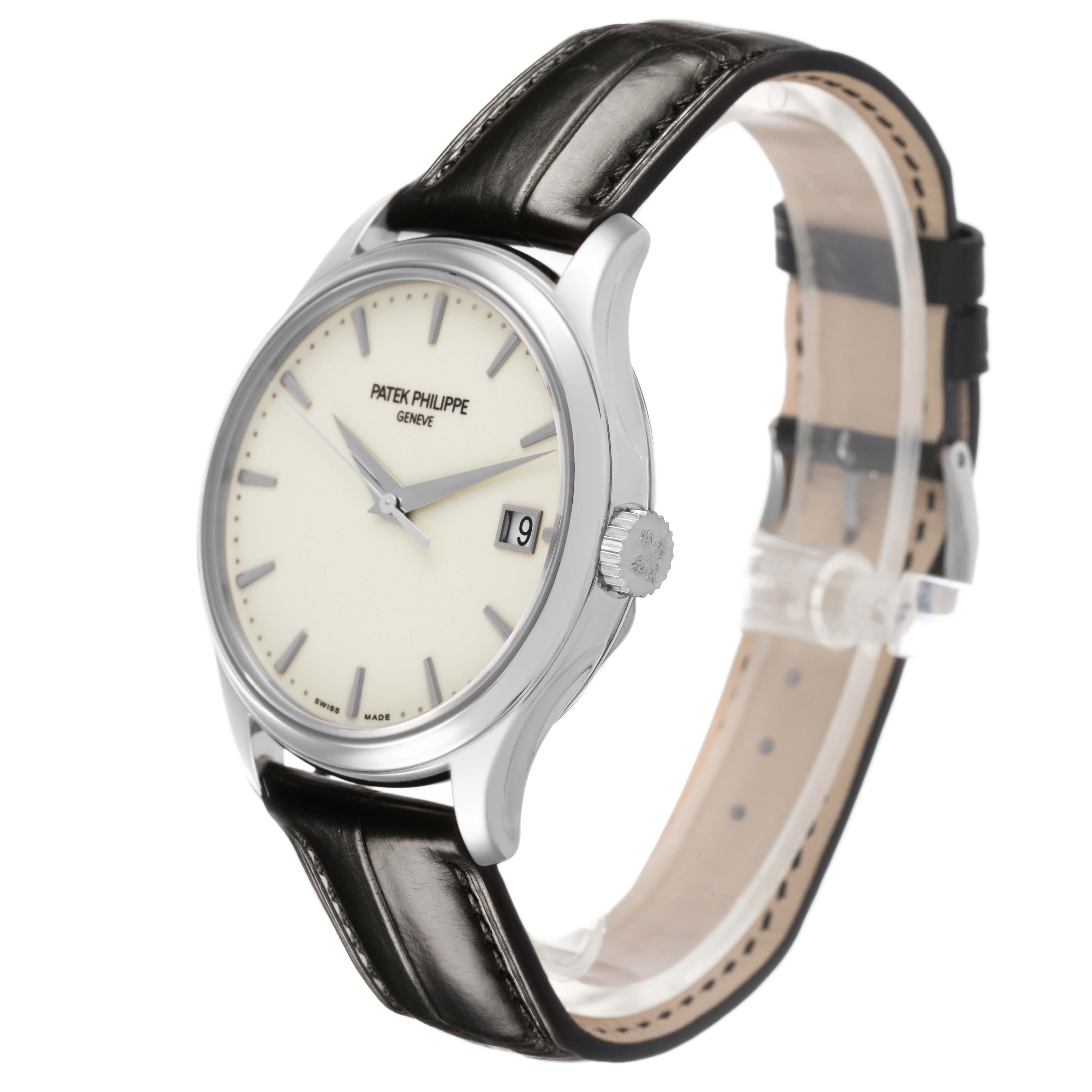 The Patek Philippe Calatrava 5227G-001 Men's White Gold Beige Dial watch is shown in a side angle highlighting the dial, bezel, crown, and leather strap.