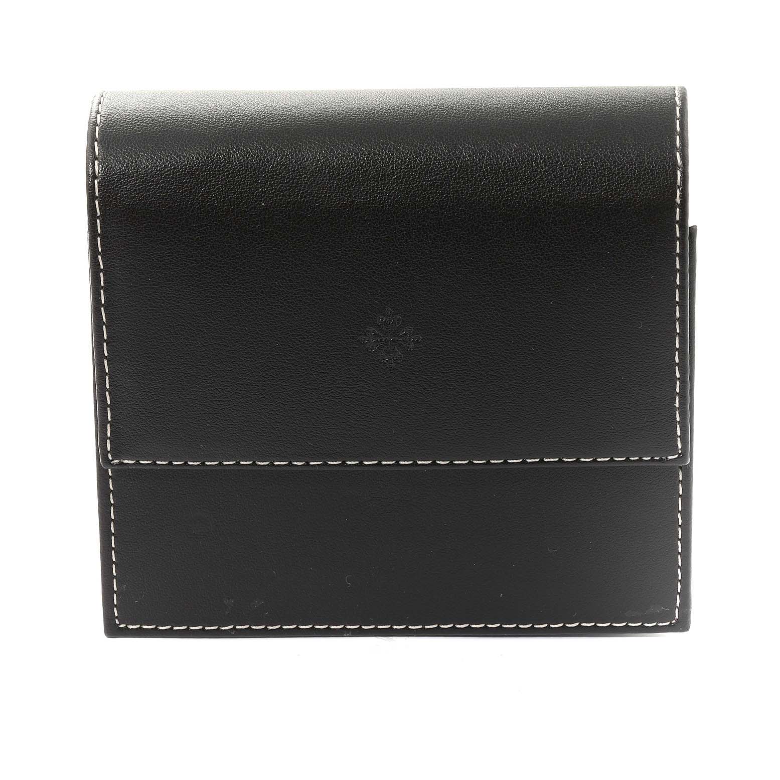 This image shows a black leather box with white stitching, which appears to be a storage case for the Patek Philippe Calatrava 4897R-001 Women's Rose Gold Brown Dial 4897R-001 Women's Rose Gold Brown Dial model watch.