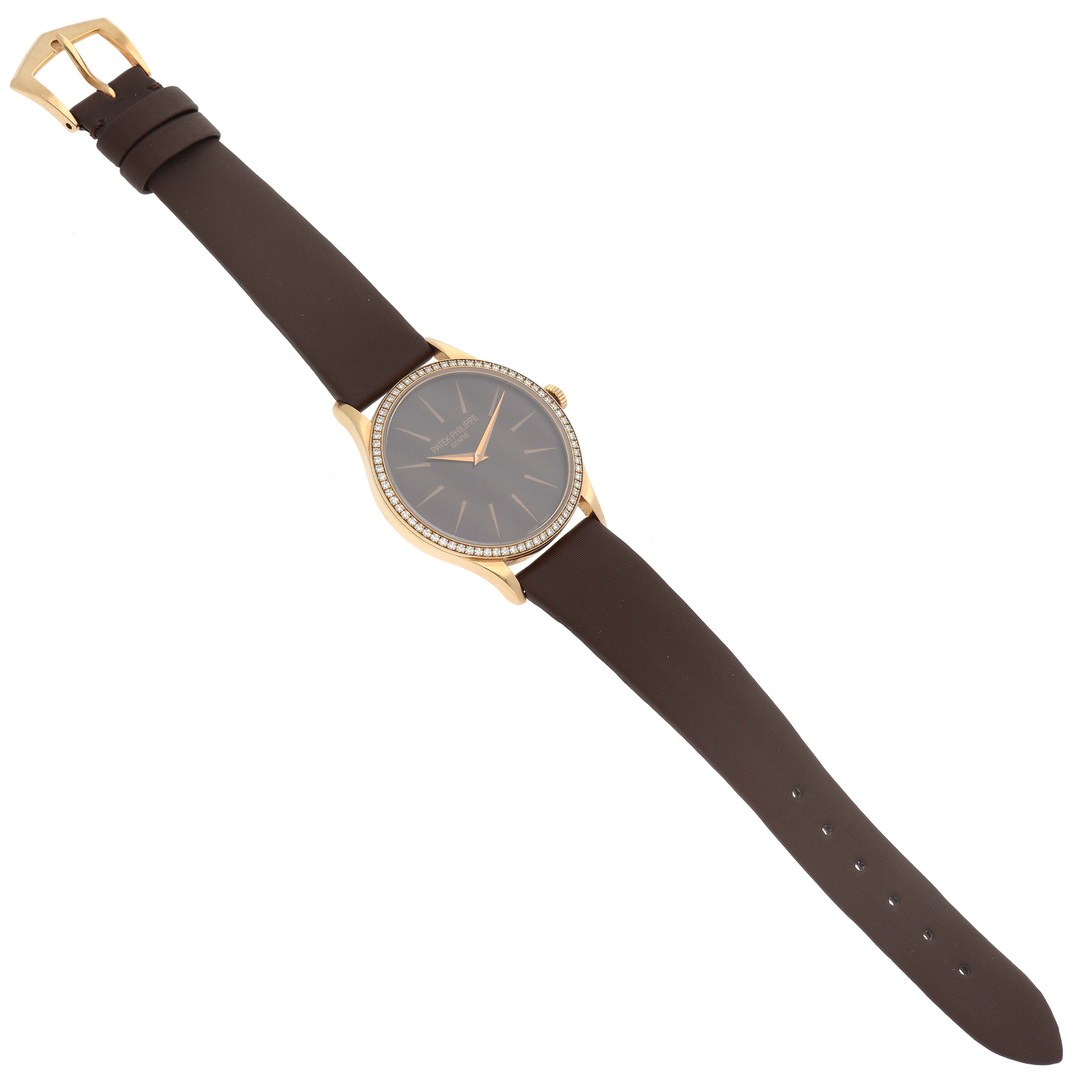 The image shows a top-down view of a Patek Philippe Calatrava 4897R-001 Women's Rose Gold Brown Dial 4897R-001 Women's Rose Gold Brown Dial watch displaying the face, bezel, case, strap, and buckle.