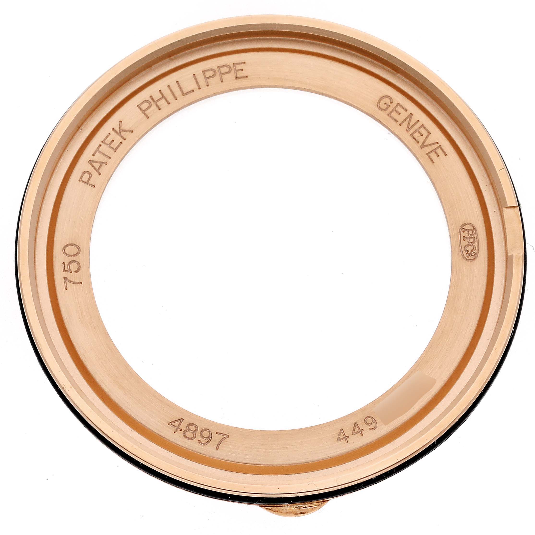 The image shows a close-up view of the bezel for the Patek Philippe Calatrava 4897R-001 Women's Rose Gold Brown Dial 4897R-001 Women's Rose Gold Brown Dial model.