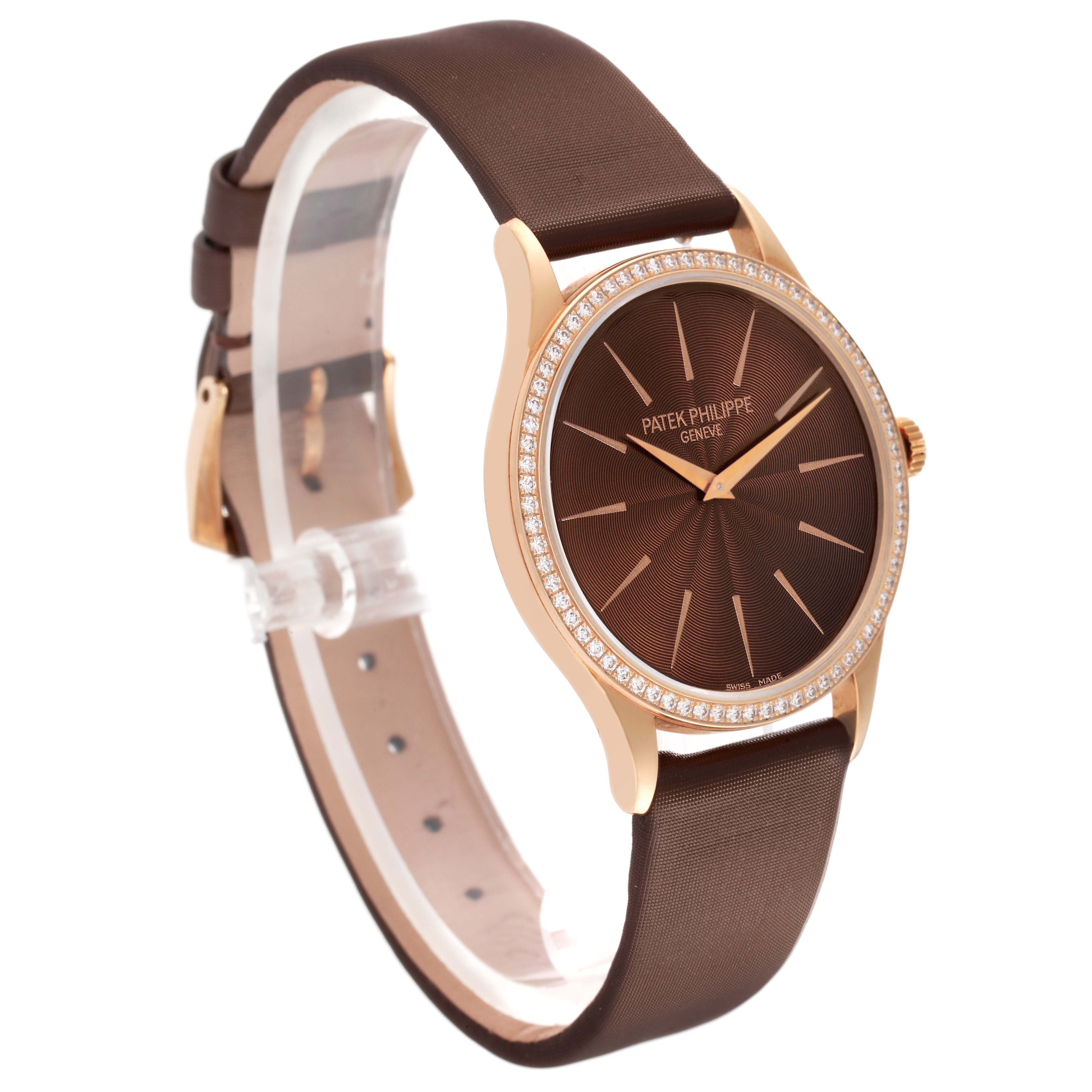 The Patek Philippe Calatrava 4897R-001 Women's Rose Gold Brown Dial watch is shown at a three-quarter angle, highlighting the dial, case, and part of the strap.