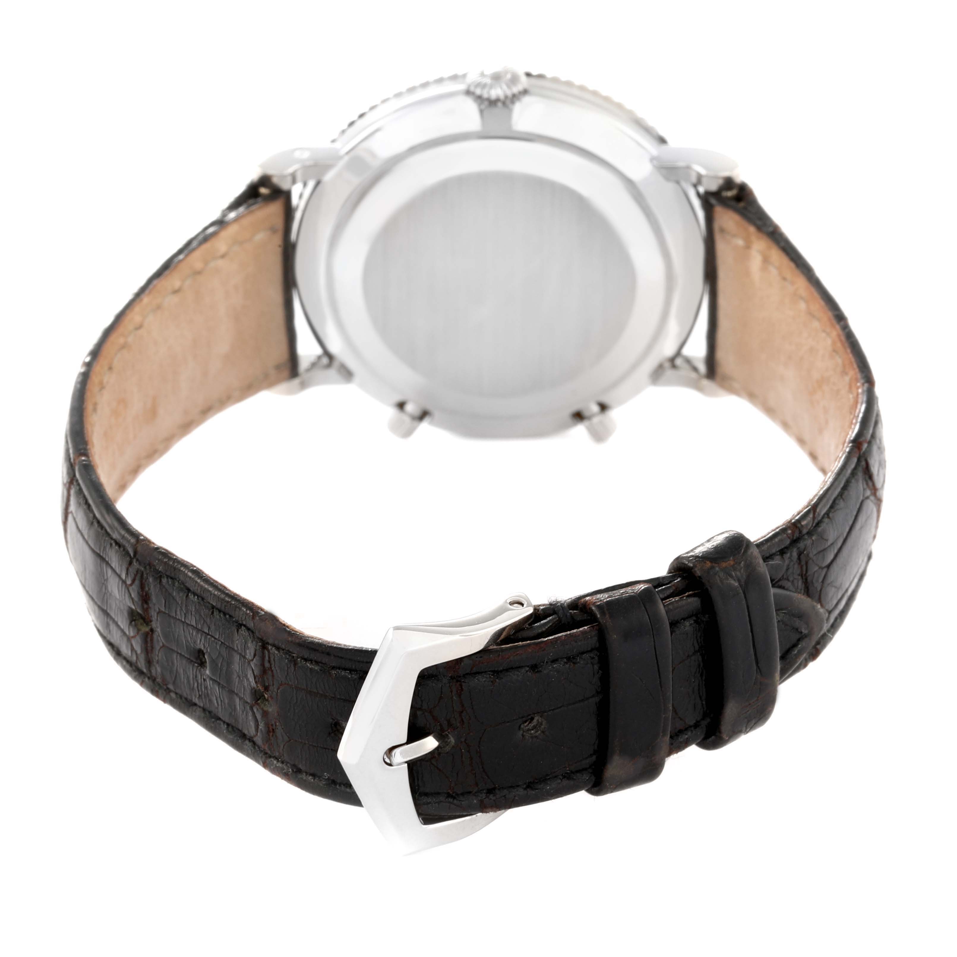 The image shows the back view of a Patek Philippe Calatrava 5034G Men
s White Gold White Dial 5034G Men
s White Gold White Dial watch, highlighting the caseback and leather strap with buckle.