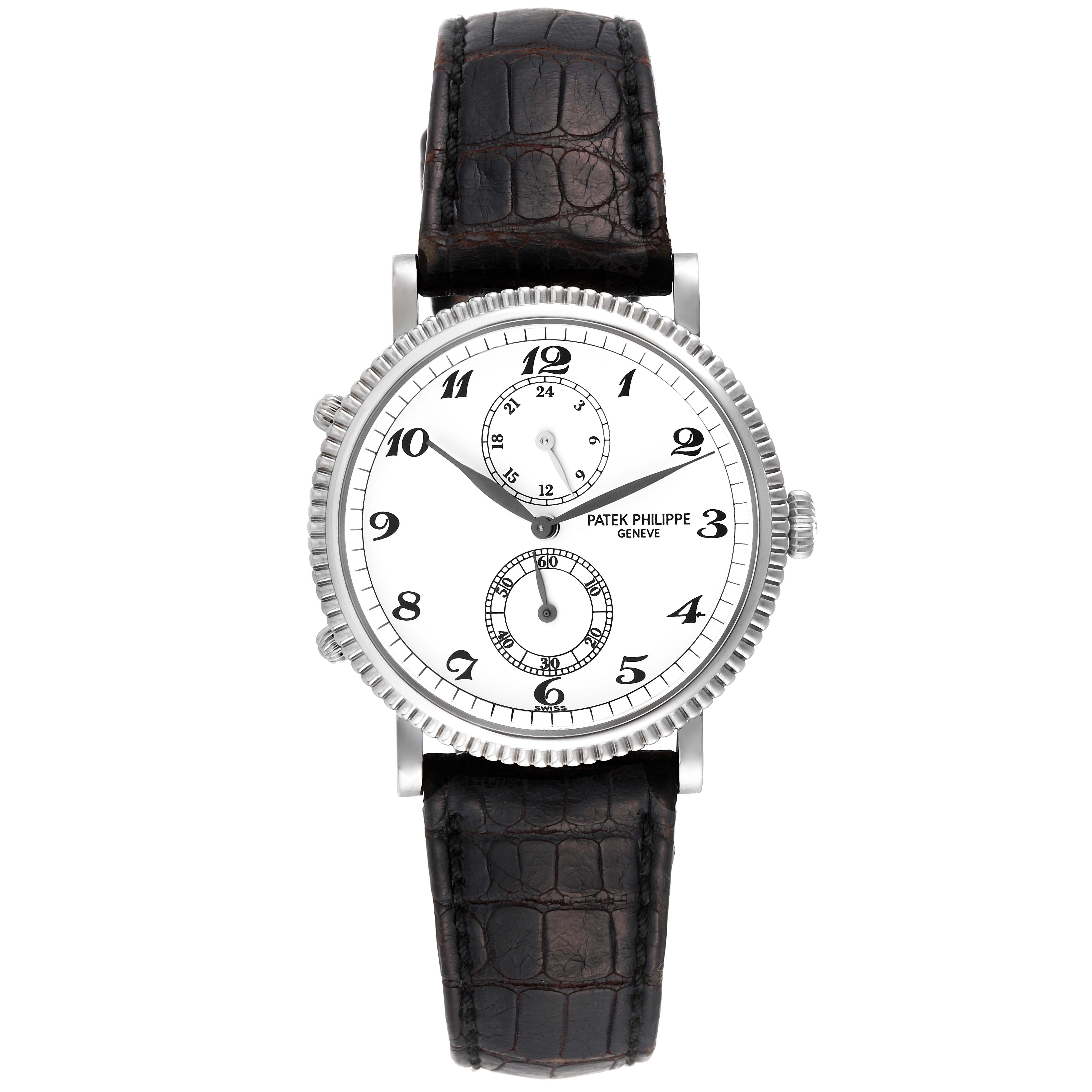 The image shows a front view of a Patek Philippe Calatrava 5034G Men
s White Gold White Dial 5034G Men
s White Gold White Dial watch featuring a white dial, black numerals, and leather strap.