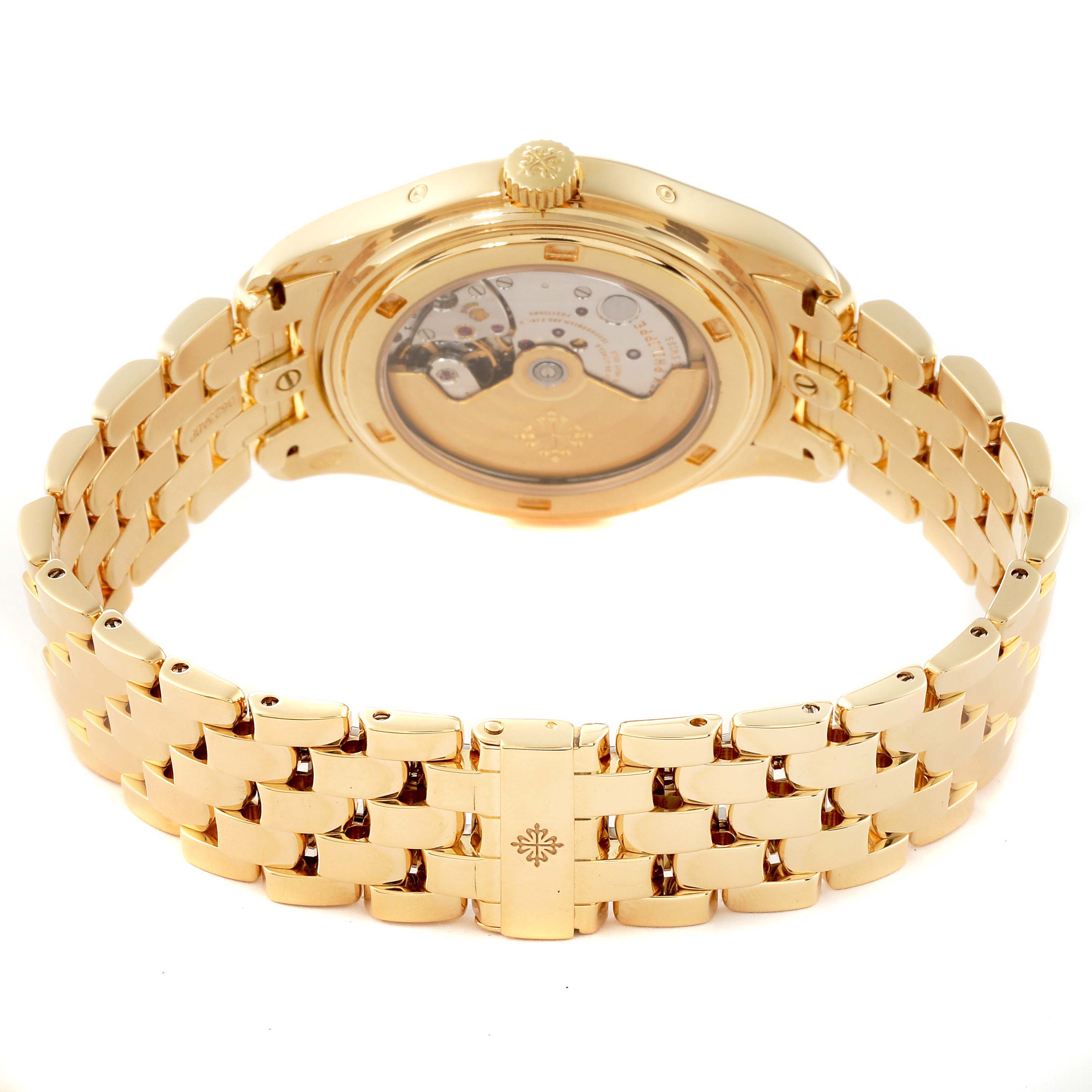 This image shows the back of a Patek Philippe Complications 5146J Men's Yellow Gold White Dial 5146J Men's Yellow Gold White Dial watch, highlighting the movement and gold bracelet.