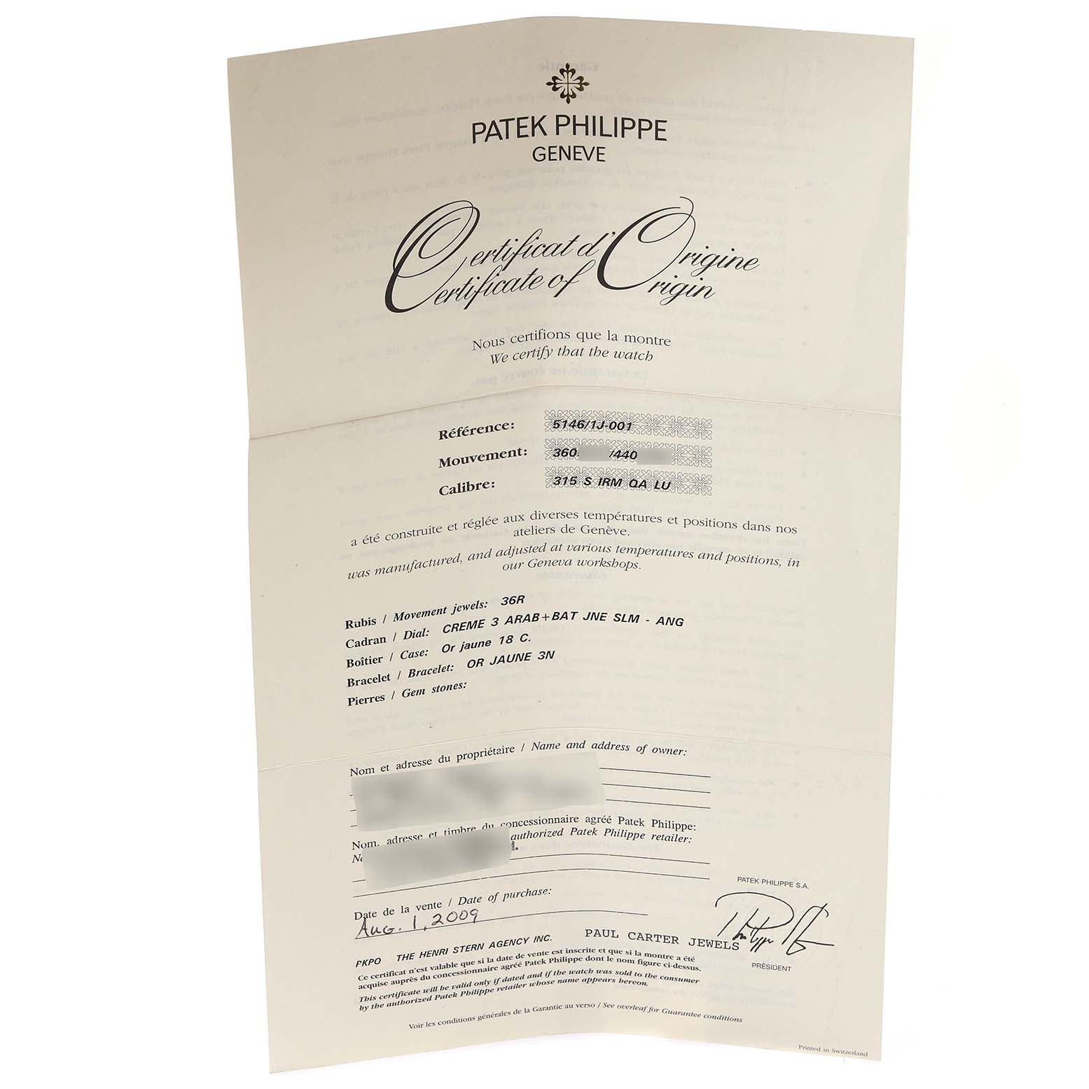This is a top-down shot of the Certificate of Origin for the Patek Philippe Complications 5146J Men's Yellow Gold White Dial 5146J Men's Yellow Gold White Dial model.