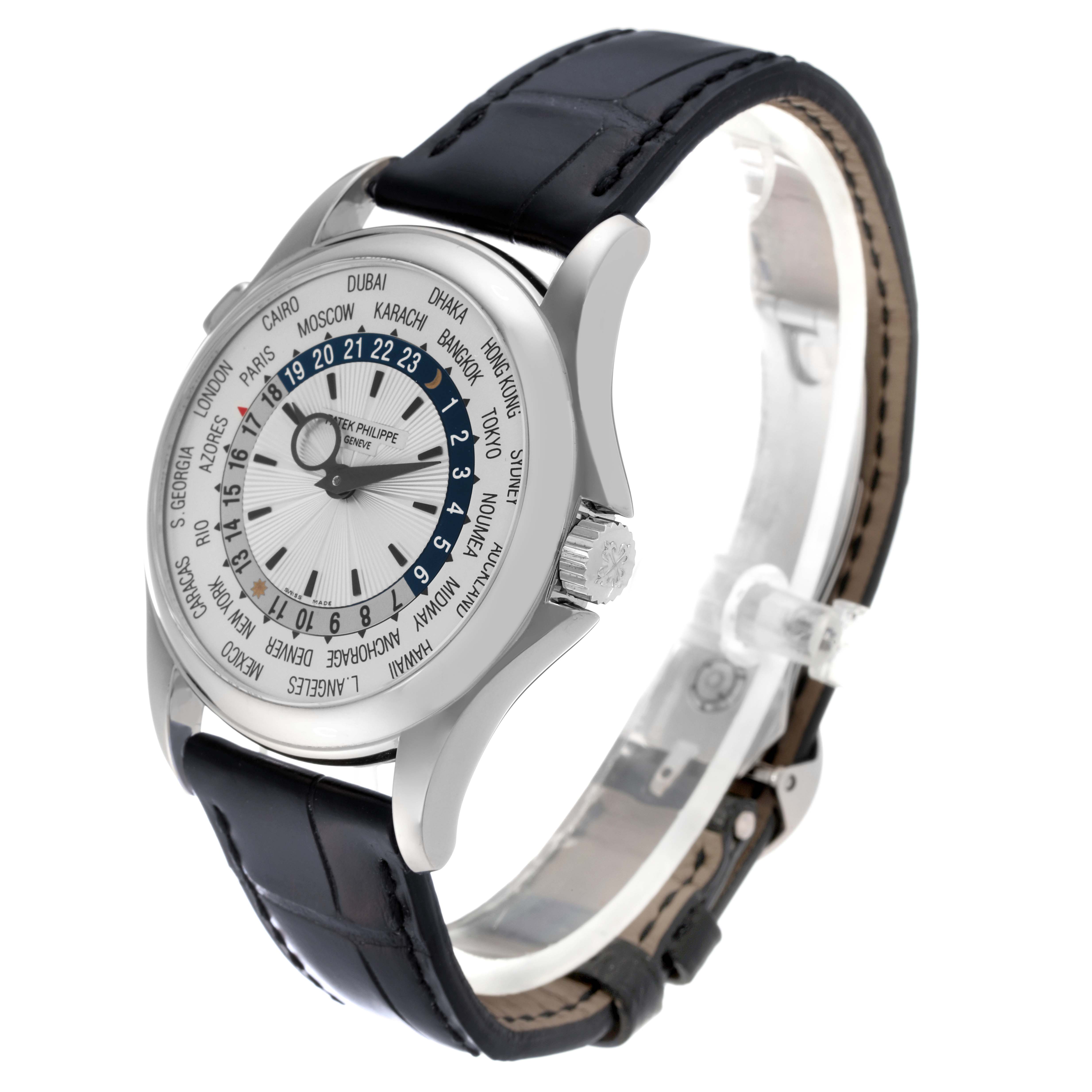 The image shows a Patek Philippe Complications 5130G Men
s White Gold Silver Dial 5130G Men
s White Gold Silver Dial model watch at a three-quarter angle highlighting the face and leather strap.