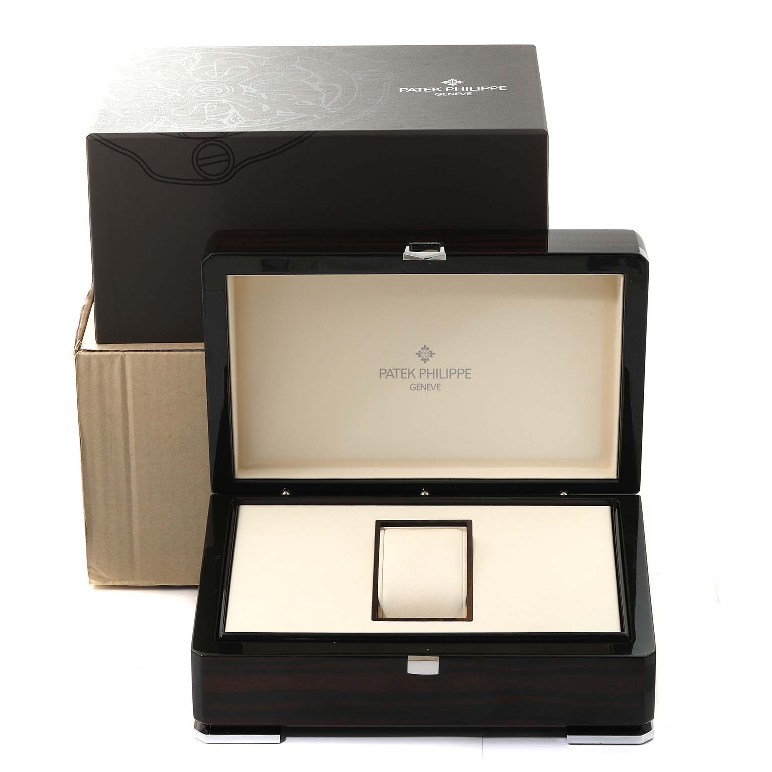 The image shows the open packaging box for the Patek Philippe Complications 5130G Men
s White Gold Silver Dial 5130G Men
s White Gold Silver Dial model watch, including an interior cushion and outer box.