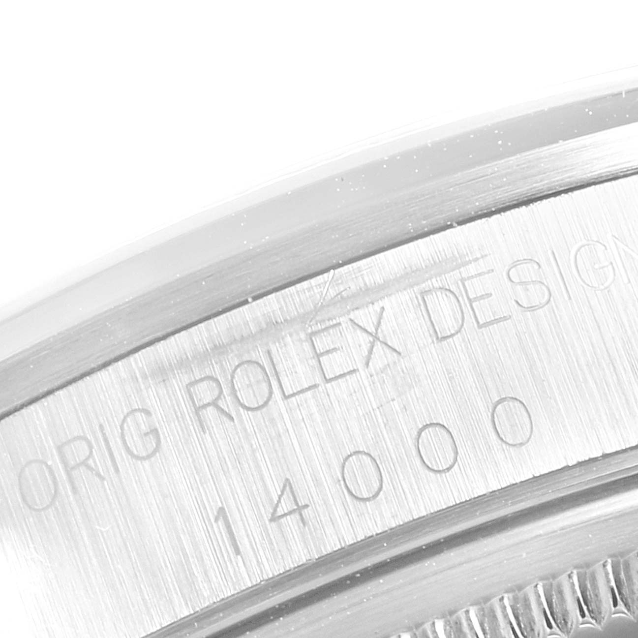 This image shows a close-up of the case with the engraved serial number of a Rolex Air-King 14000 Men's Stainless Steel Blue Dial 14000 Men's Stainless Steel Blue Dial watch.
