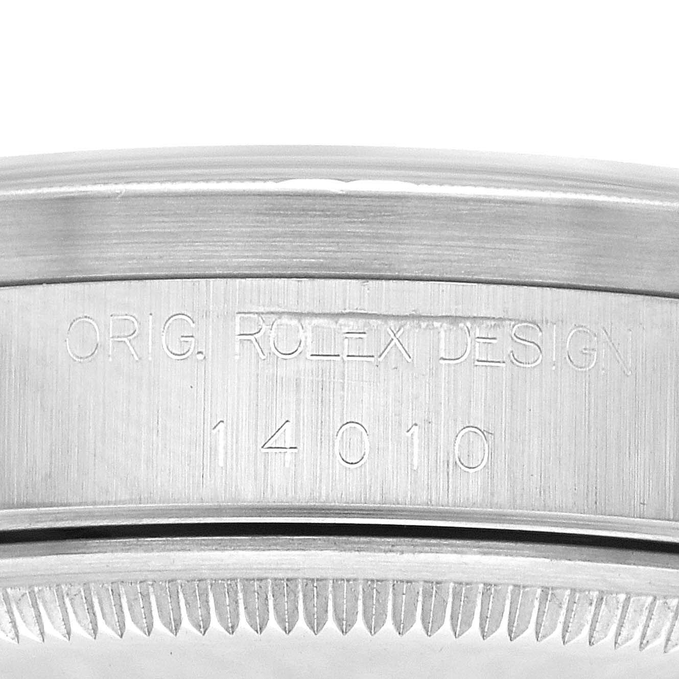 The image shows the side of the Rolex Air-King 14010 Men's Stainless Steel White Dial 14010 Men's Stainless Steel White Dial, highlighting the engraved "ORIG. ROLEX DESIGN" and the model number 14010.