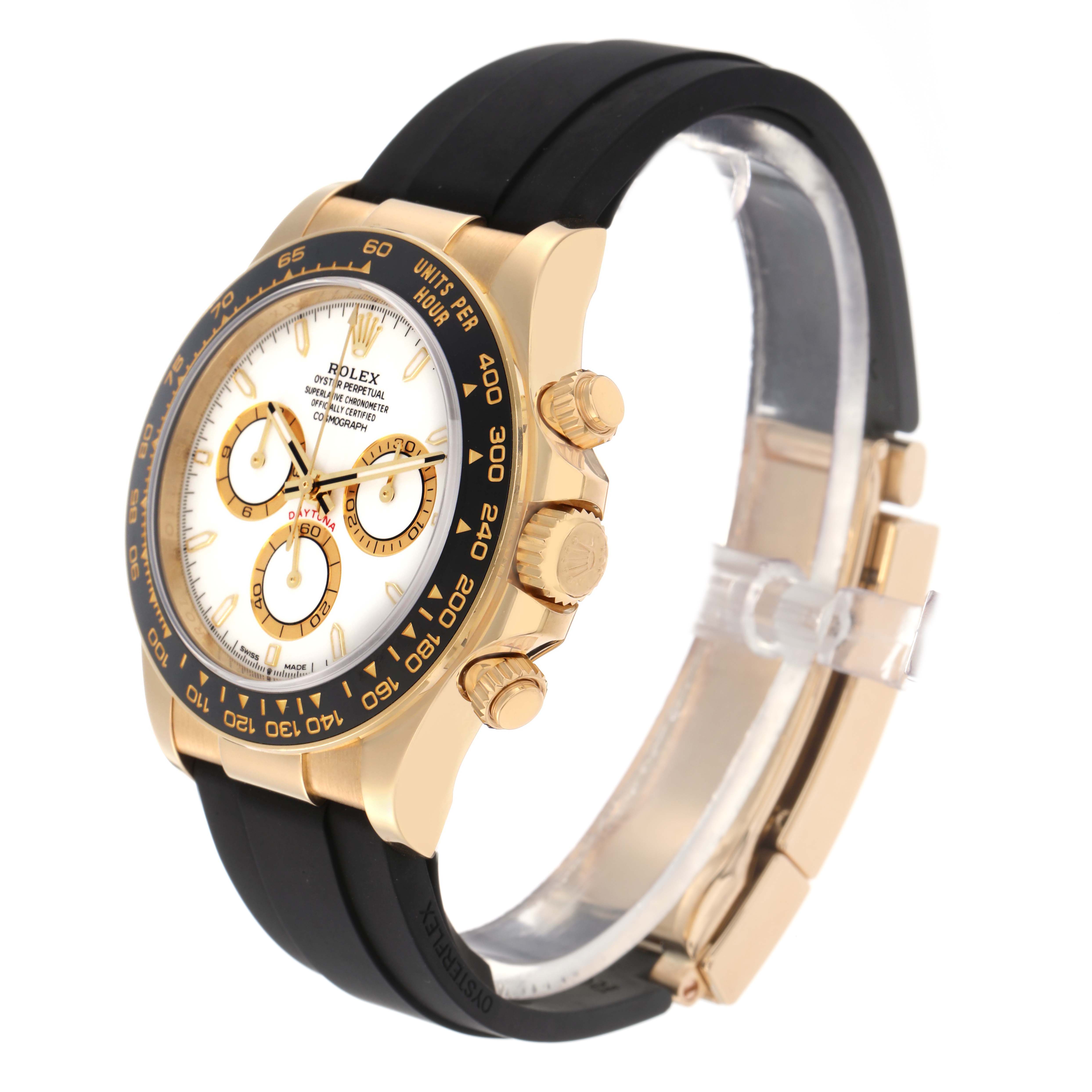 The Rolex Daytona 126518 Men
s Yellow Gold White Dial 126518 Men
s Yellow Gold White Dial watch is shown at a three-quarter angle, displaying the face, bezel, crown, pushers, and strap.