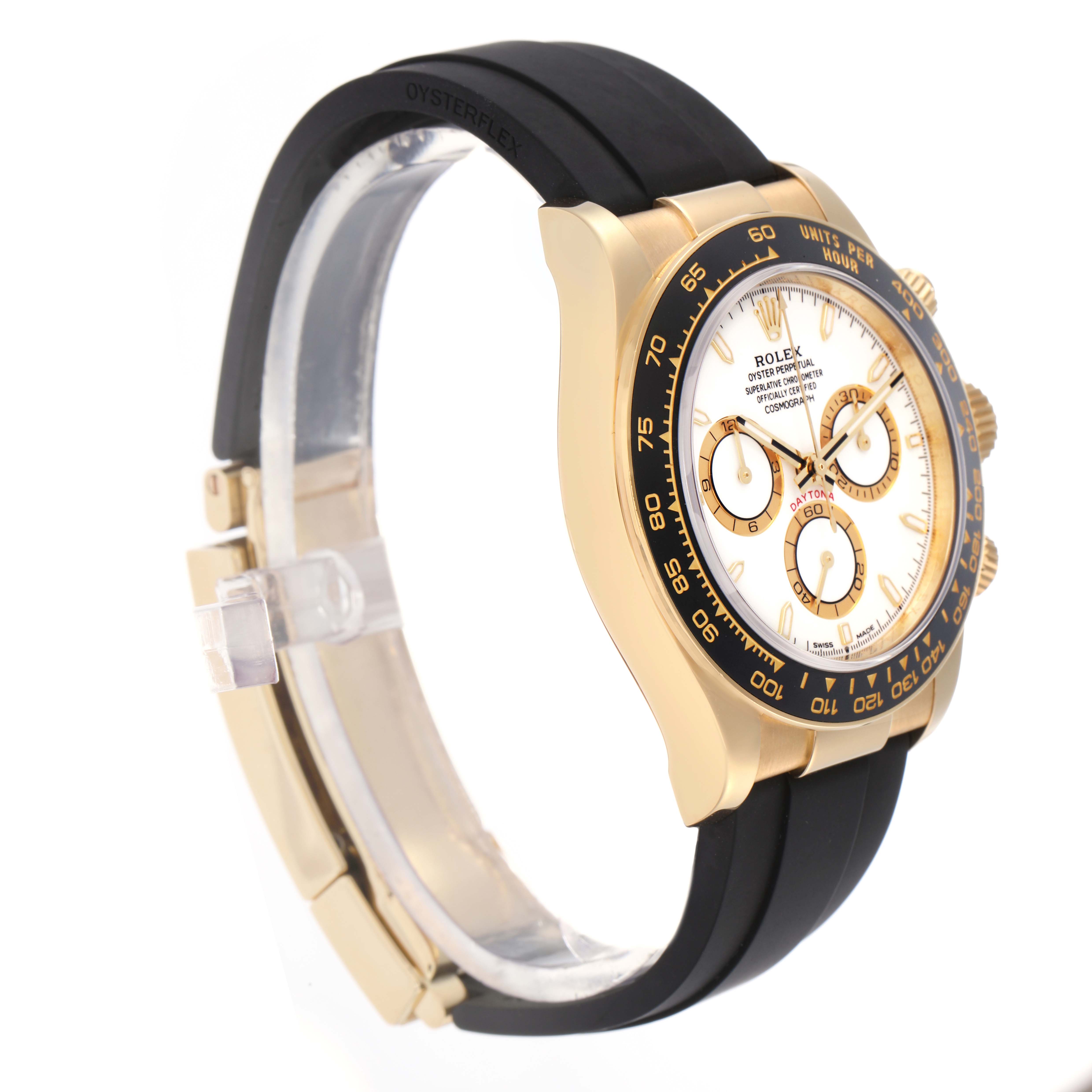 The Rolex Daytona 126518 Men
s Yellow Gold White Dial 126518 Men
s Yellow Gold White Dial watch is shown at a side angle, highlighting the gold case, bezel, dial, and black Oysterflex strap.