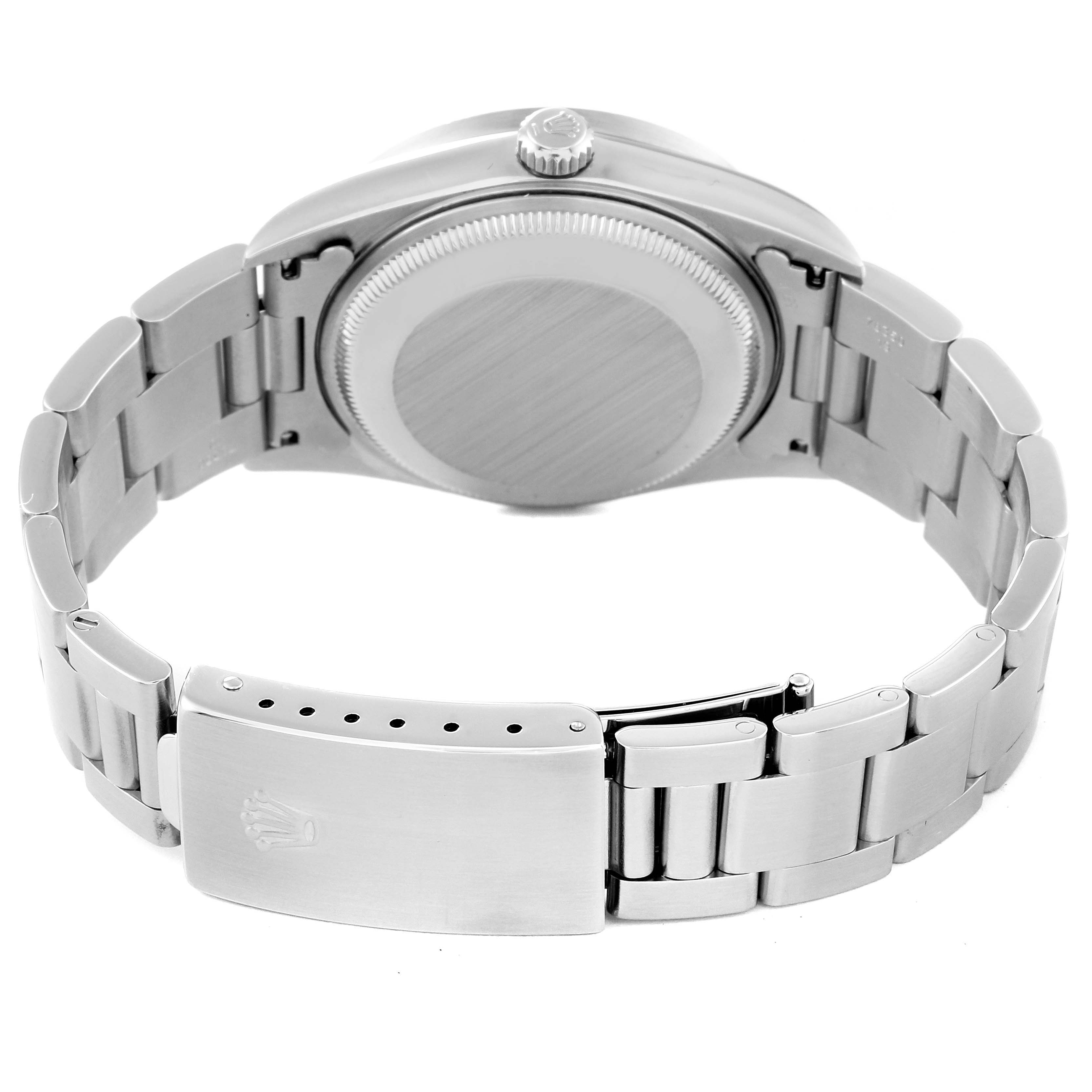 The image shows the back of a Rolex Date 15210 Men's Stainless Steel White Dial 15210 Men's Stainless Steel White Dial model watch, including the closed case back and bracelet clasp.