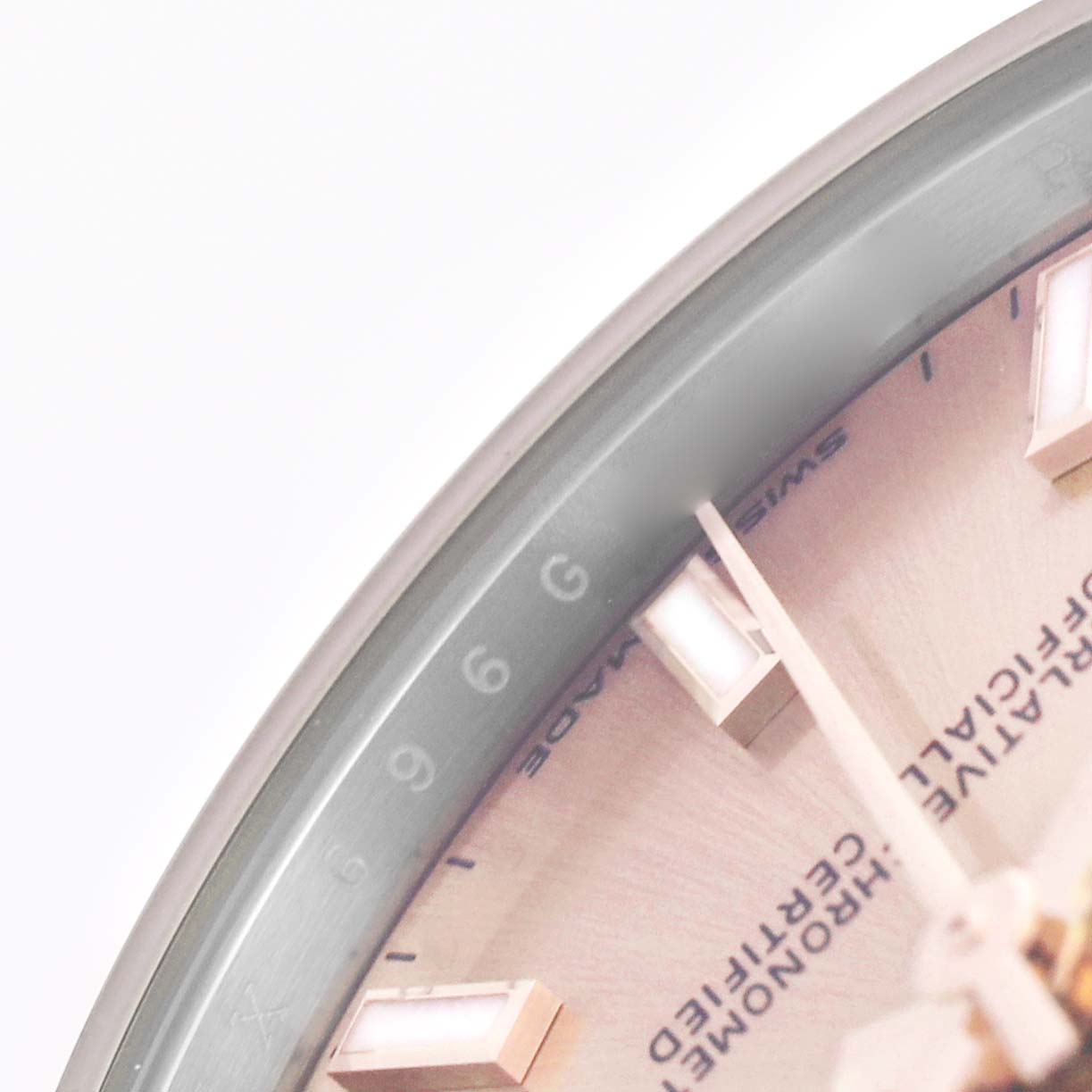 The image shows a close-up of the dial, hour markers, and part of the bezel of the Rolex Datejust 278241-0009 Women's Steel and Gold (two tone) Pink Dial watch.