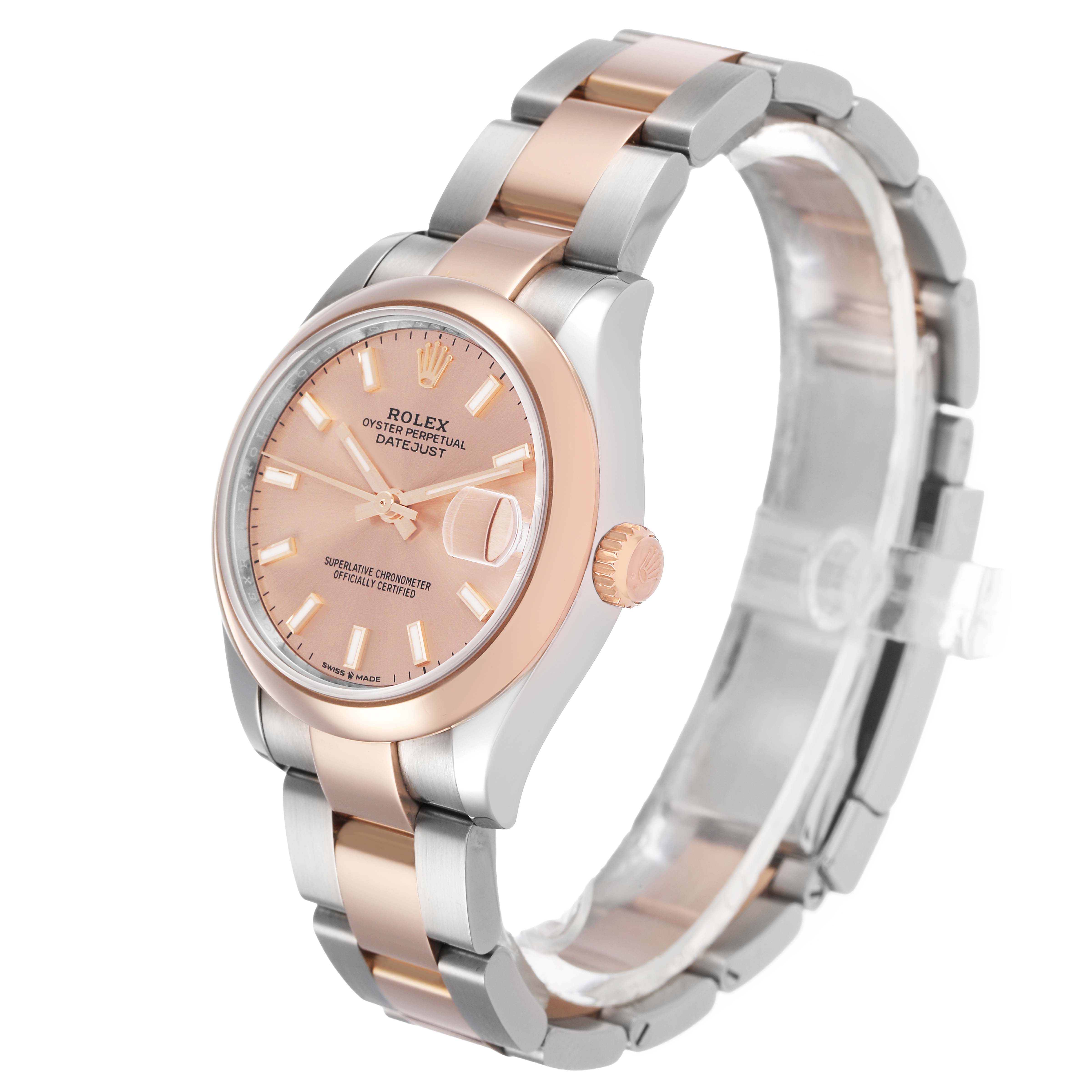 The Rolex Datejust 278241-0009 Women's Steel and Gold (two tone) Pink Dial watch is shown at an angle highlighting the rose gold and silver bracelet, crown, and dial.