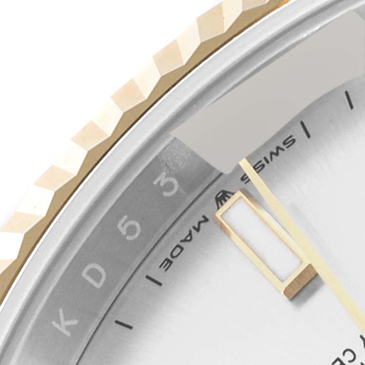 This close-up image shows the bezel, dial, and part of the hour hand of the Rolex Datejust 41 126333 Men's Steel and Gold (two tone) Silver Dial 126333 Men's Steel and Gold (two tone) Silver Dial model.