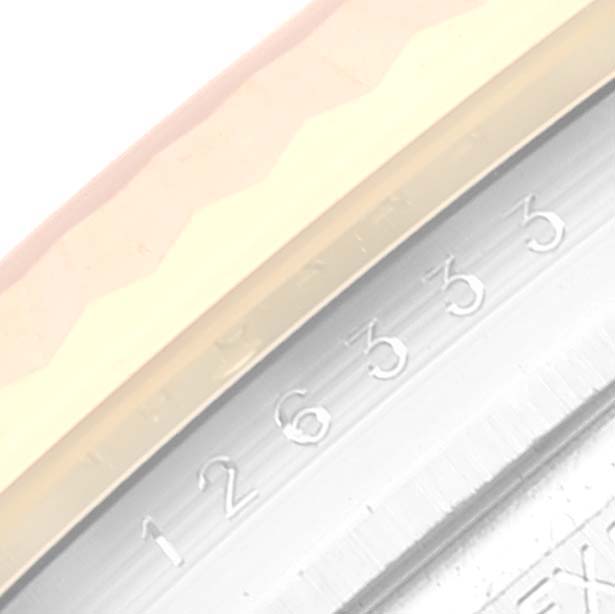 The image shows a close-up of the Datejust 41 model watch bezel and part of the serial number by Rolex.