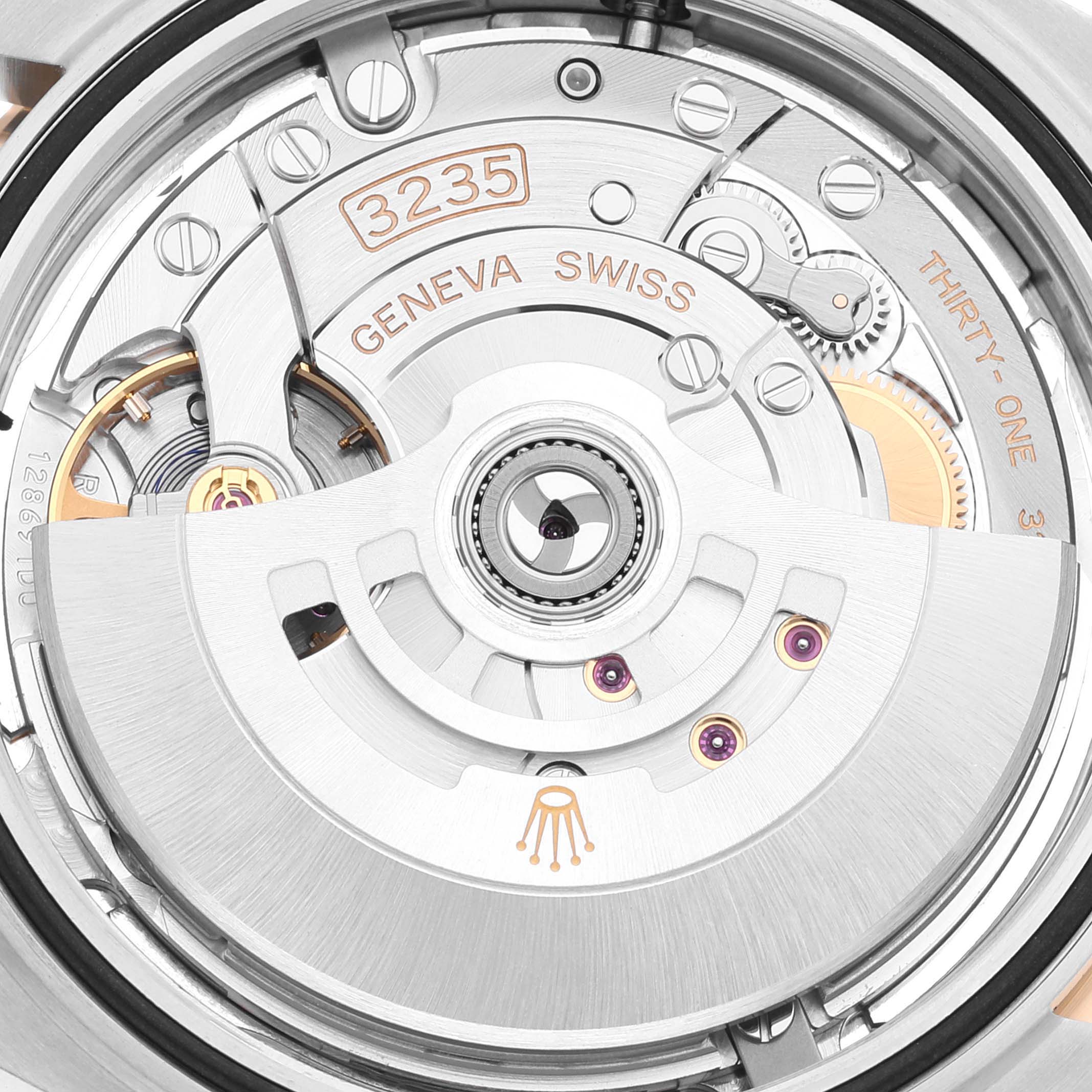 The image shows the inner mechanical movement of a Rolex Datejust 41 126333 Men's Steel and Gold (two tone) Silver Dial 126333 Men's Steel and Gold (two tone) Silver Dial watch, focusing on the rotor and visible gears.