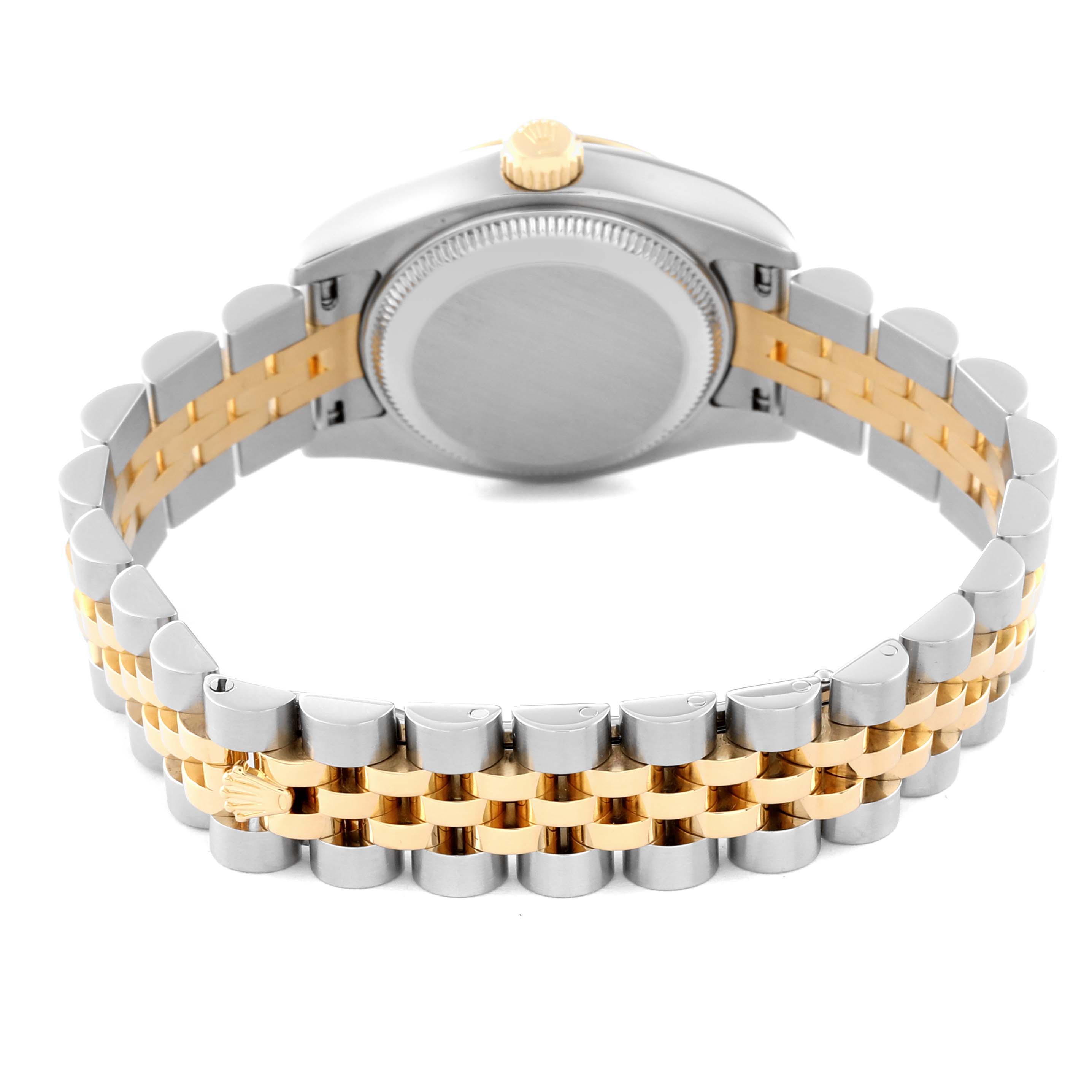 The image shows the back view of a Rolex Datejust 179173 Women's Steel and Gold (two tone) Champagne Dial 179173 Women's Steel and Gold (two tone) Champagne Dial watch, highlighting its two-tone bracelet and caseback.