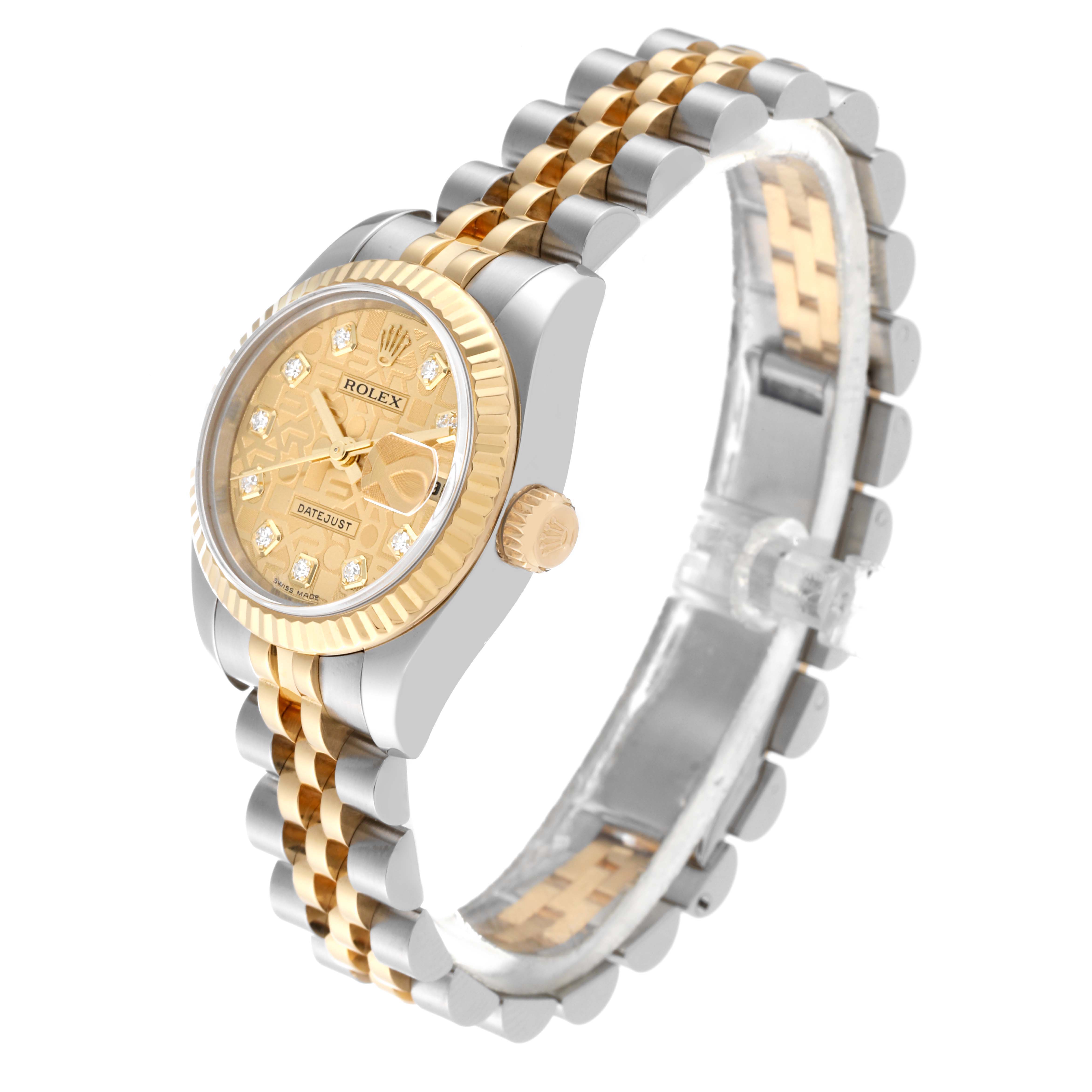 The Rolex Datejust 179173 Women's Steel and Gold (two tone) Champagne Dial 179173 Women's Steel and Gold (two tone) Champagne Dial watch is shown from a front-side angle, highlighting the dial, bezel, crown, and two-tone bracelet.