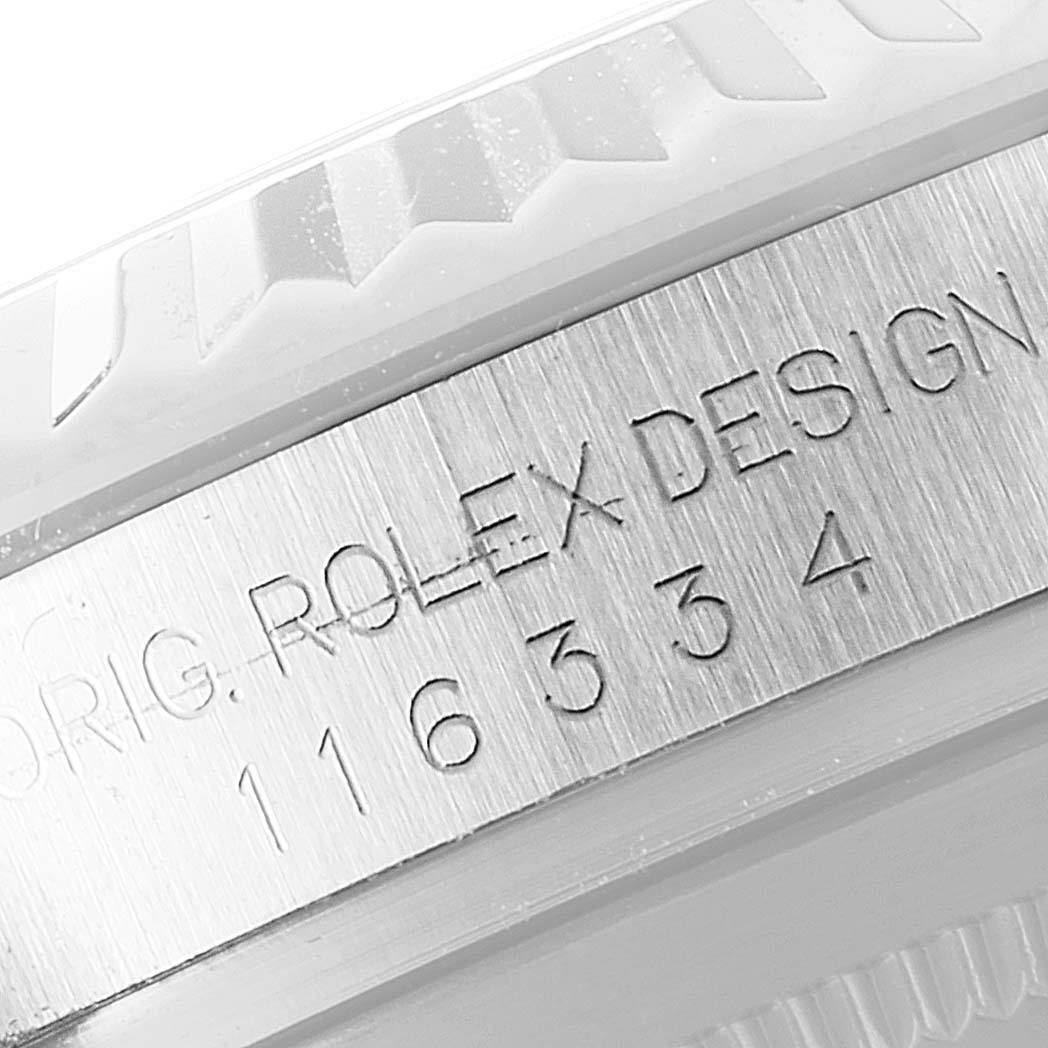 This close-up angle shows the engraved side of the bezel and case of a Rolex Datejust 41 116334 Men
s Stainless Steel Blue Dial 116334 Men
s Stainless Steel Blue Dial watch, displaying its model number.