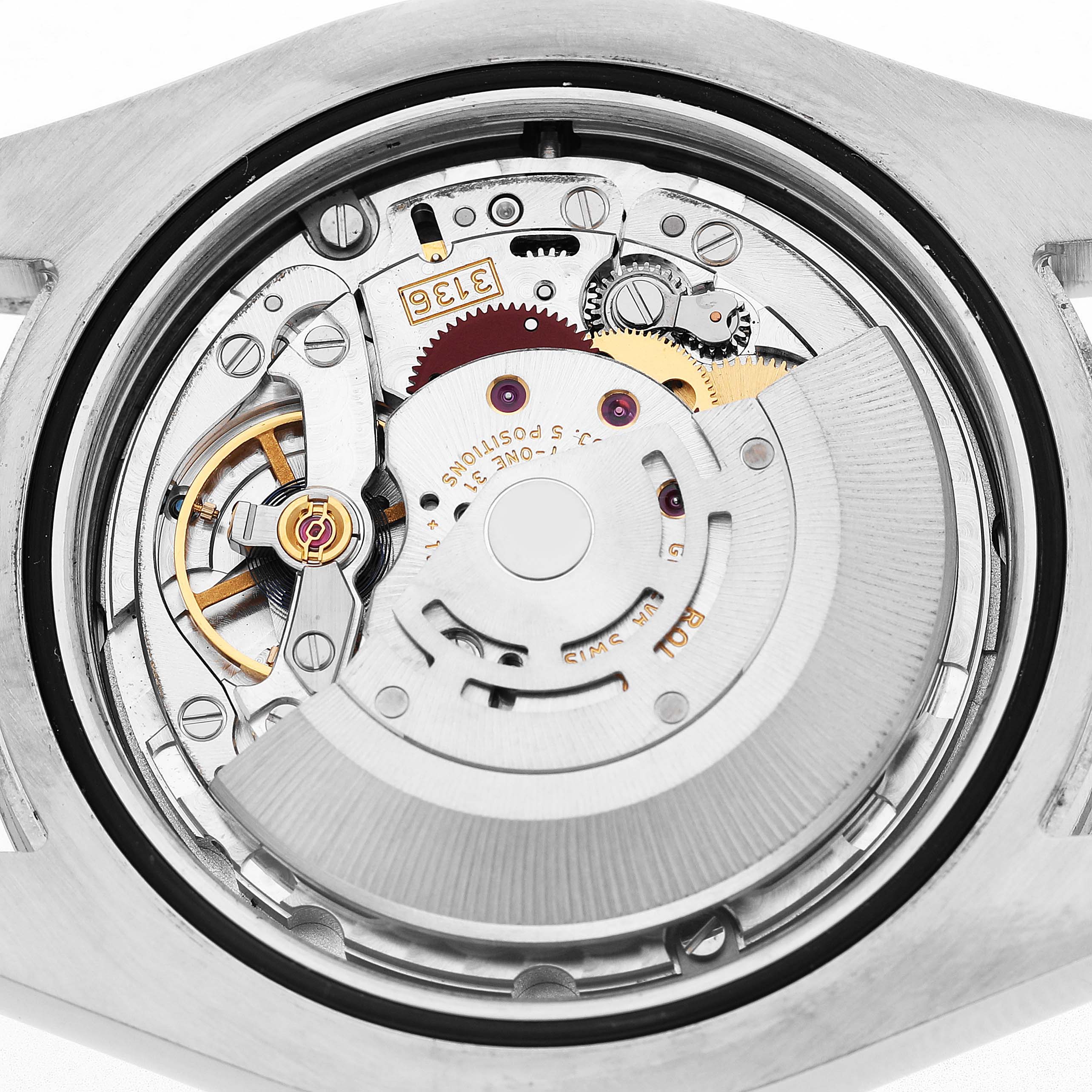 The image shows a close-up of the movement and internal components of a Rolex Datejust 116334 Men's Stainless Steel Blue Dial watch from a top-down angle.