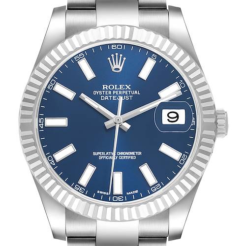 The image shows a frontal view of a Rolex Datejust 116334 Men's Stainless Steel Blue Dial watch, highlighting its blue dial, fluted bezel, and date window.