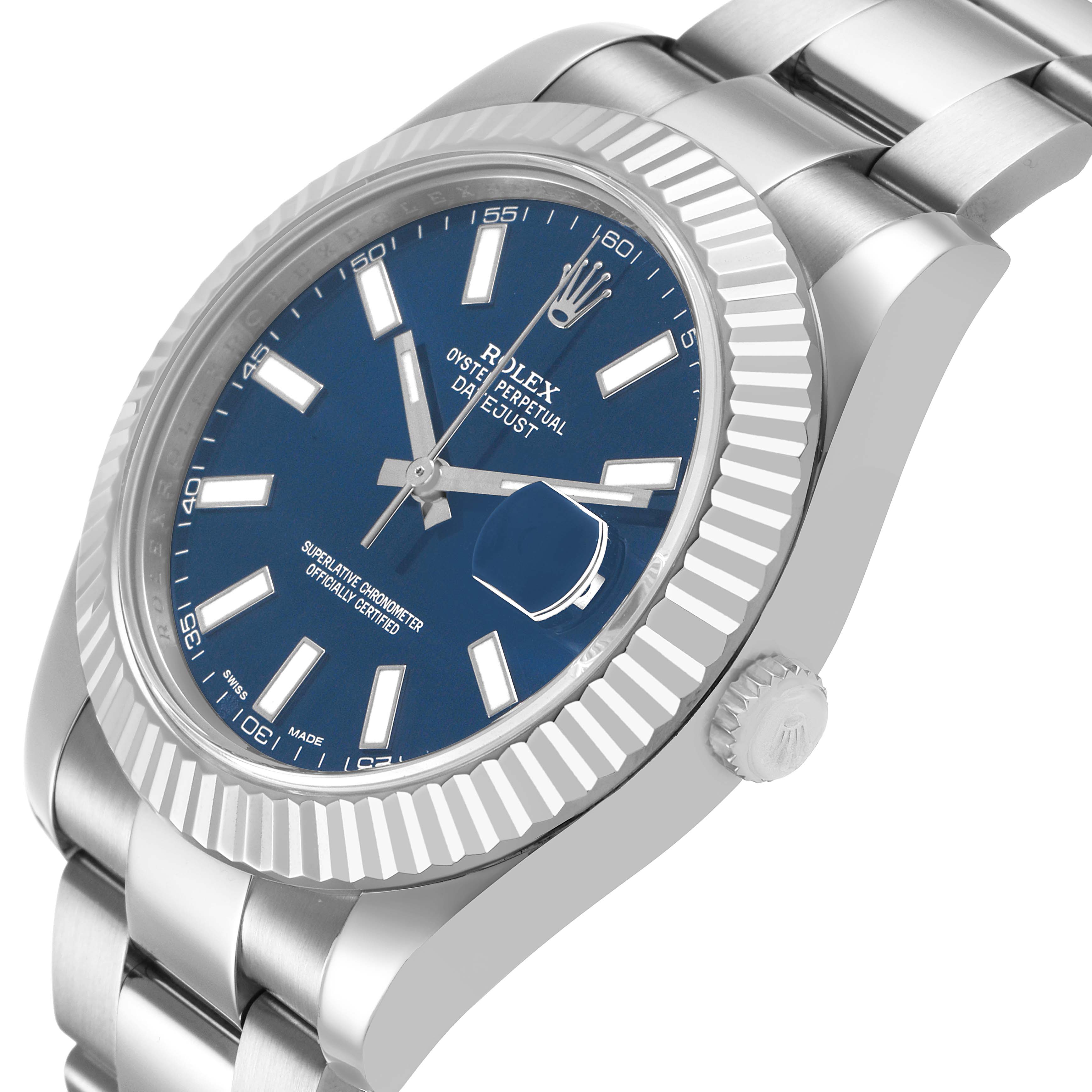 The Rolex Datejust 116334 Men's Stainless Steel Blue Dial watch is shown at a diagonal angle, highlighting the bezel, dial, crown, and part of the bracelet.