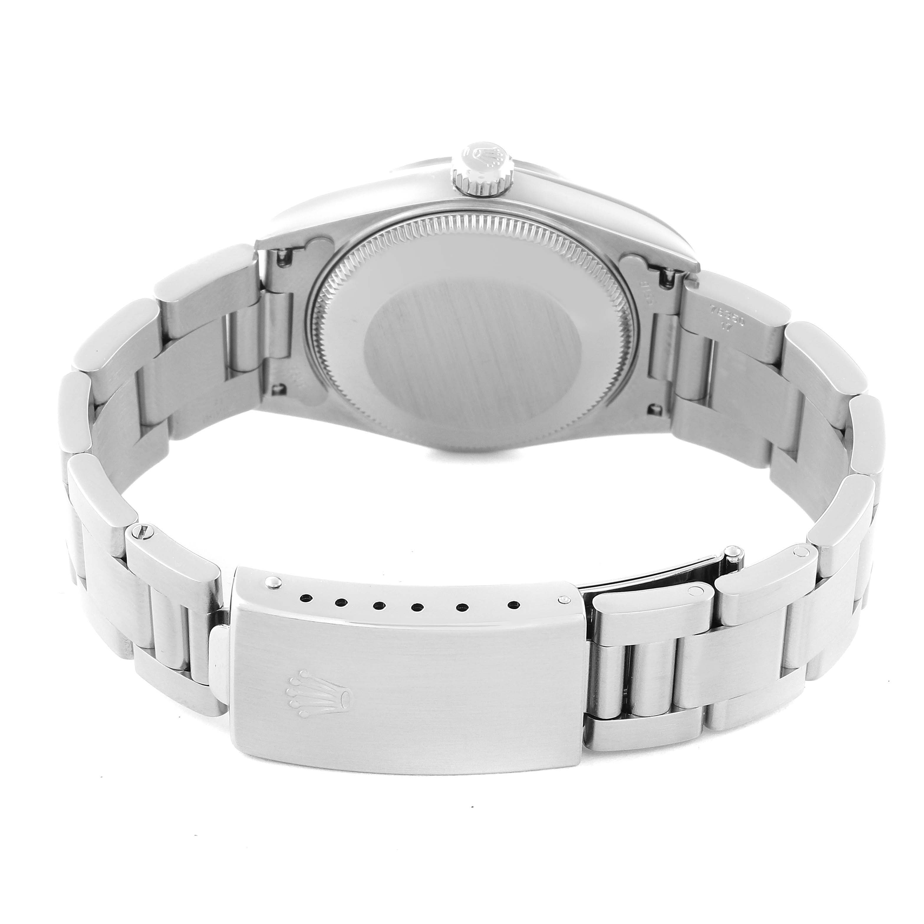 The image shows the back angle of a Rolex Mid-Size 78274 Women's Stainless Steel Black Dial 78274 Women's Stainless Steel Black Dial watch, highlighting its case back, crown, and bracelet with the clasp.