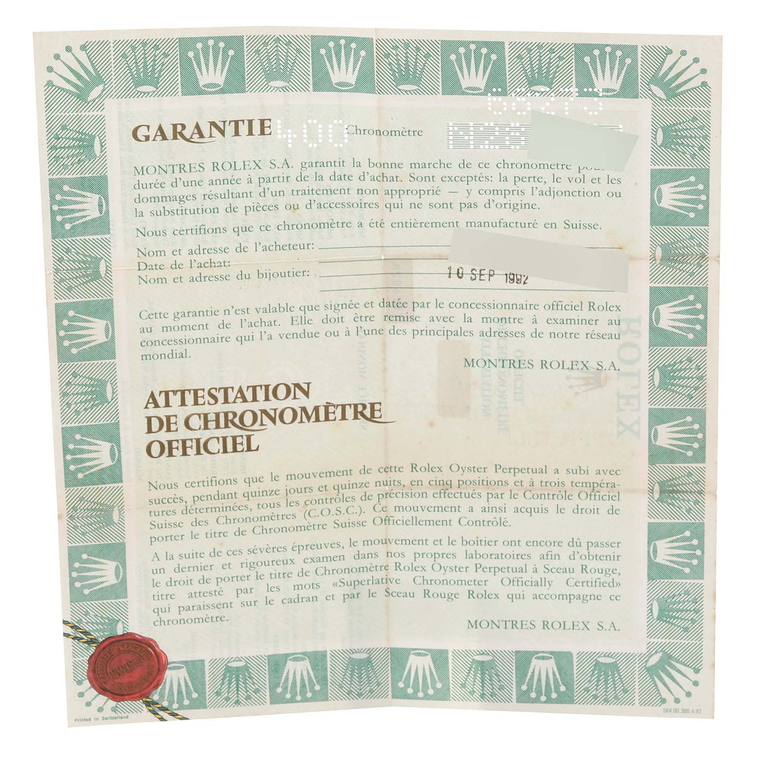 This image shows the guarantee and official chronometer certificate for a Mid-Size Rolex watch.