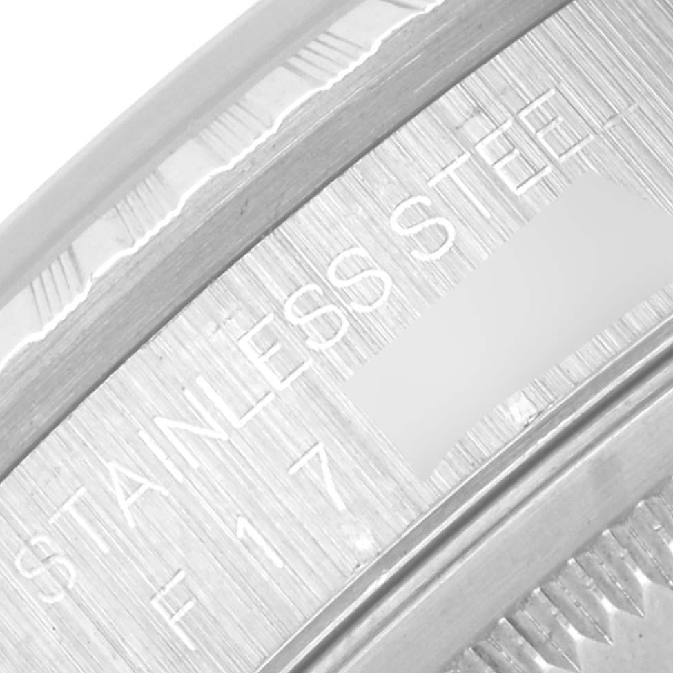 The image shows a close-up angle of the case back or inner rim of a Rolex Datejust 16220 Men's Stainless Steel Silver Dial 16220 Men's Stainless Steel Silver Dial watch, highlighting the "STAINLESS STEEL" engraving.