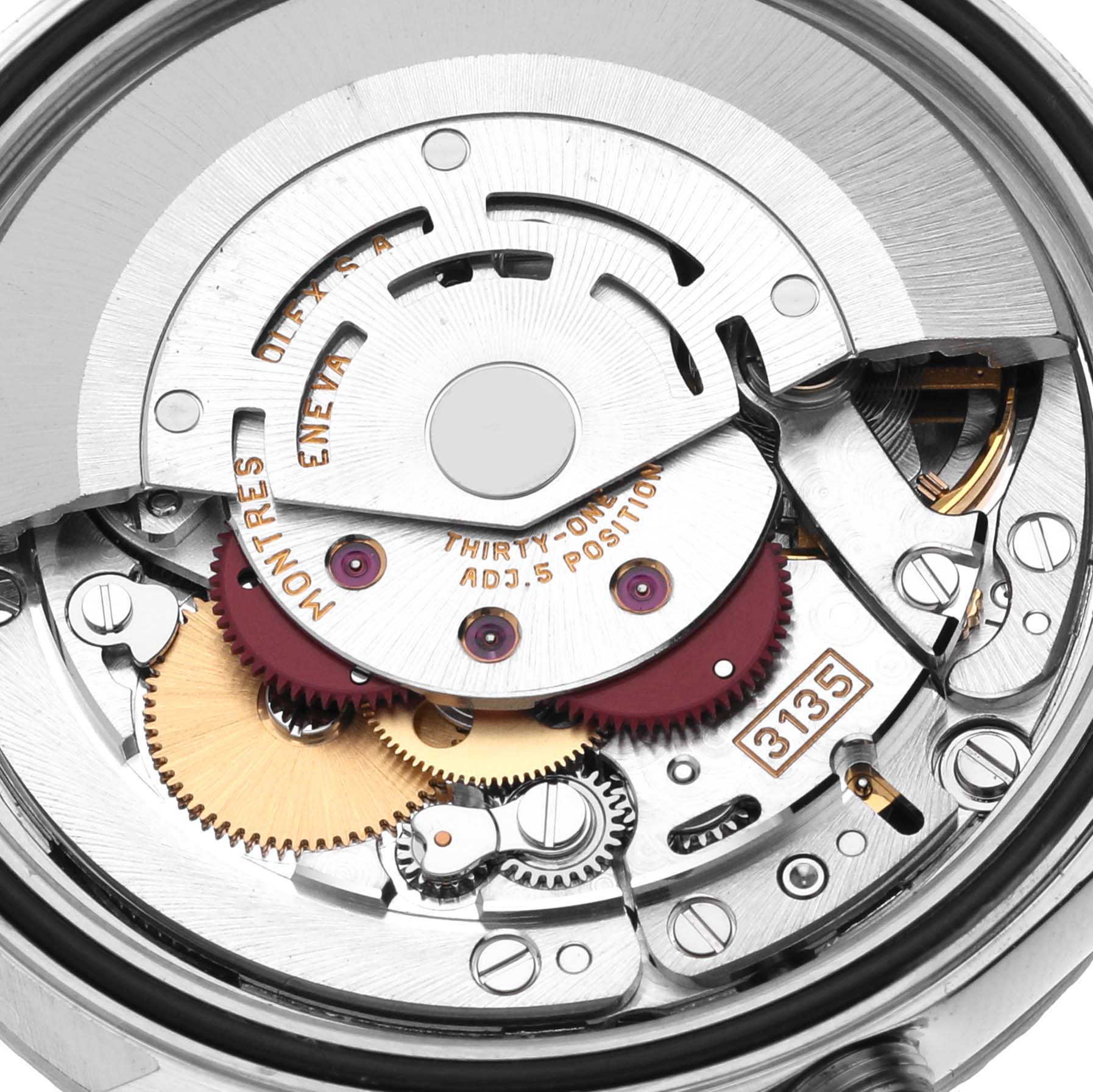 This image shows the internal movement mechanism of a Rolex Datejust 16220 Men's Stainless Steel Silver Dial 16220 Men's Stainless Steel Silver Dial watch, focusing on gears and components.