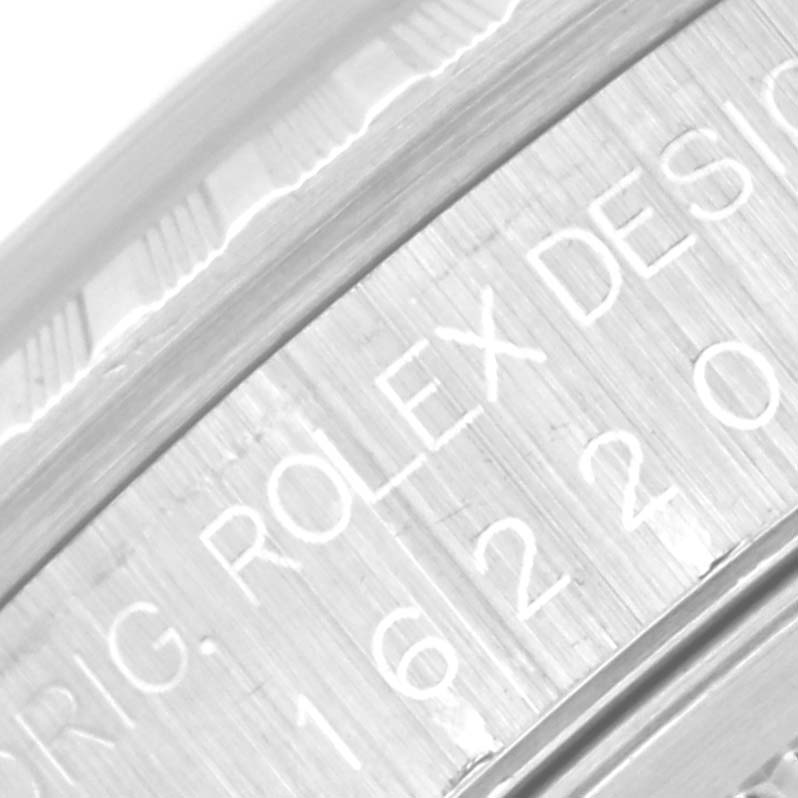 This is a close-up of the inner bezel, or rehaut, of a Rolex Datejust 16220 Men's Stainless Steel Silver Dial 16220 Men's Stainless Steel Silver Dial watch.