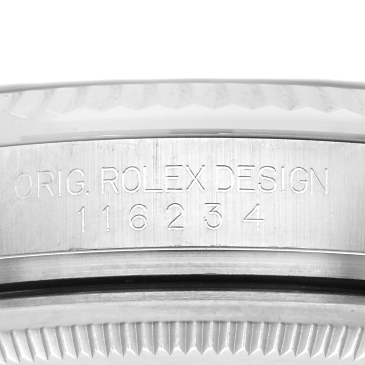 The image shows the side engraving and bezel part of a Rolex Datejust 116234 Men
s Stainless Steel Black Dial 116234 Men
s Stainless Steel Black Dial watch.