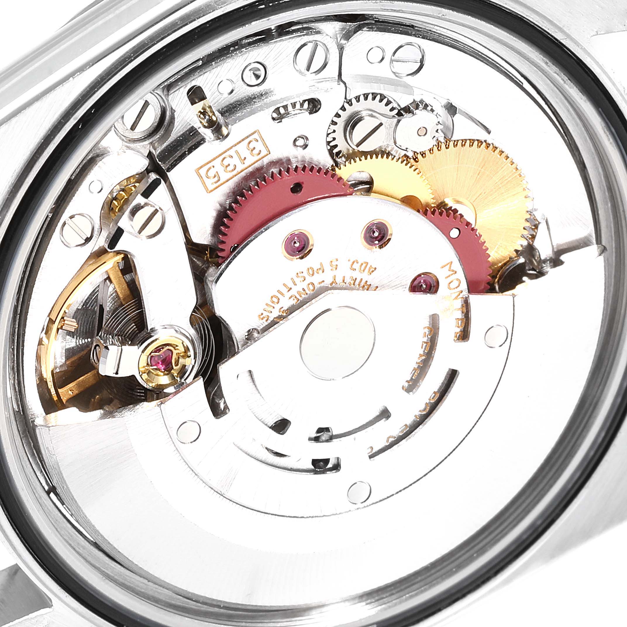This image shows the internal mechanics of a Rolex Datejust 16234 Men's Steel and Gold (two tone) Blue Dial 16234 Men's Steel and Gold (two tone) Blue Dial watch from a rear-view angle.