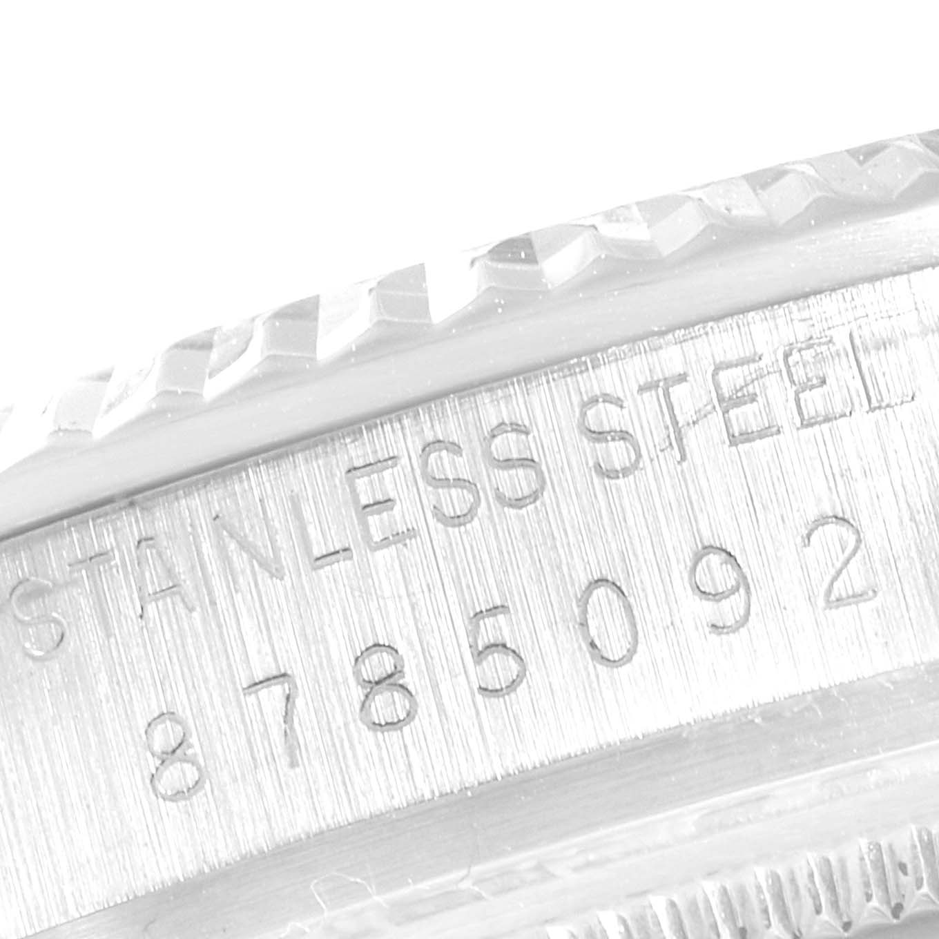 The image shows a close-up of the engraved bezel and case side of the Rolex Vintage Collection 16014 Men
s Stainless Steel Silver Dial 16014 Men
s Stainless Steel Silver Dial watch.