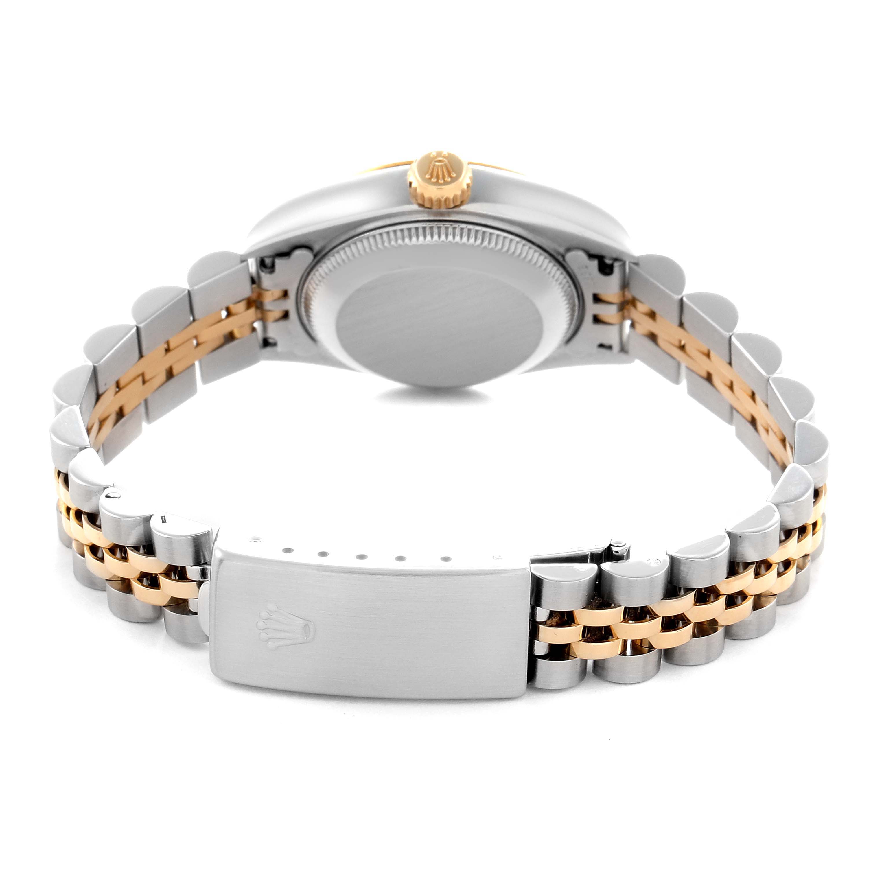 The Rolex Datejust 69173 Women
s Steel and Gold (two tone) Black Dial 69173 Women
s Steel and Gold (two tone) Black Dial watch is shown from the back, highlighting the case, crown, and Jubilee bracelet clasp.