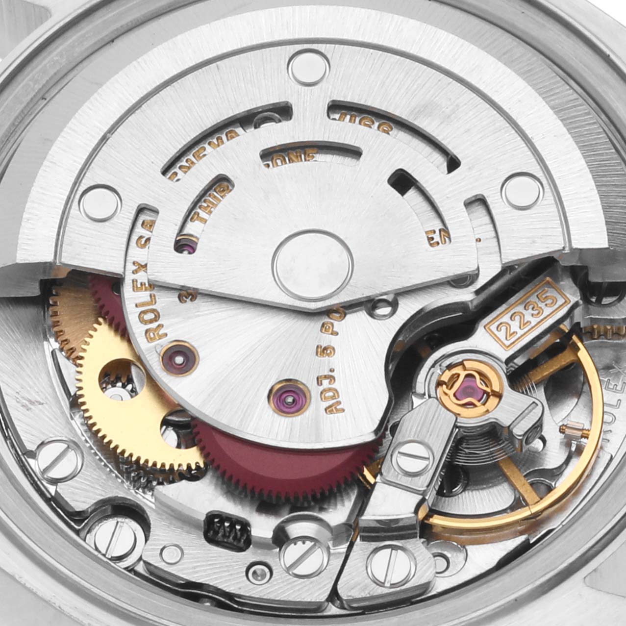 This image shows the intricate internal movement and components of the Rolex Datejust 79173 Women's Steel and Gold (two tone) Black Dial 79173 Women's Steel and Gold (two tone) Black Dial model watch from a close-up angle.