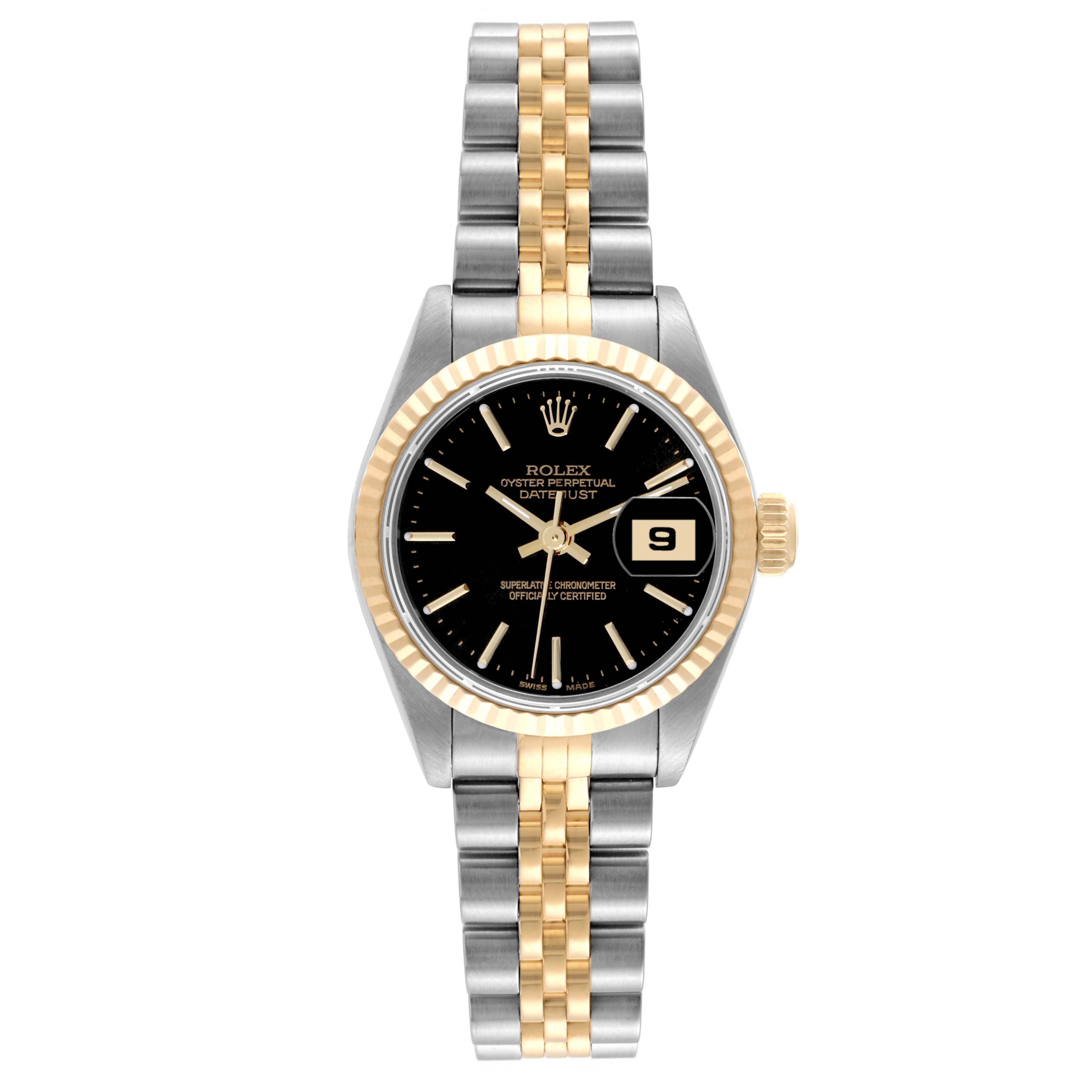The image shows a Rolex Datejust 79173 Women's Steel and Gold (two tone) Black Dial 79173 Women's Steel and Gold (two tone) Black Dial watch from a front angle, featuring a black dial, gold bezel, and two-tone metal bracelet.