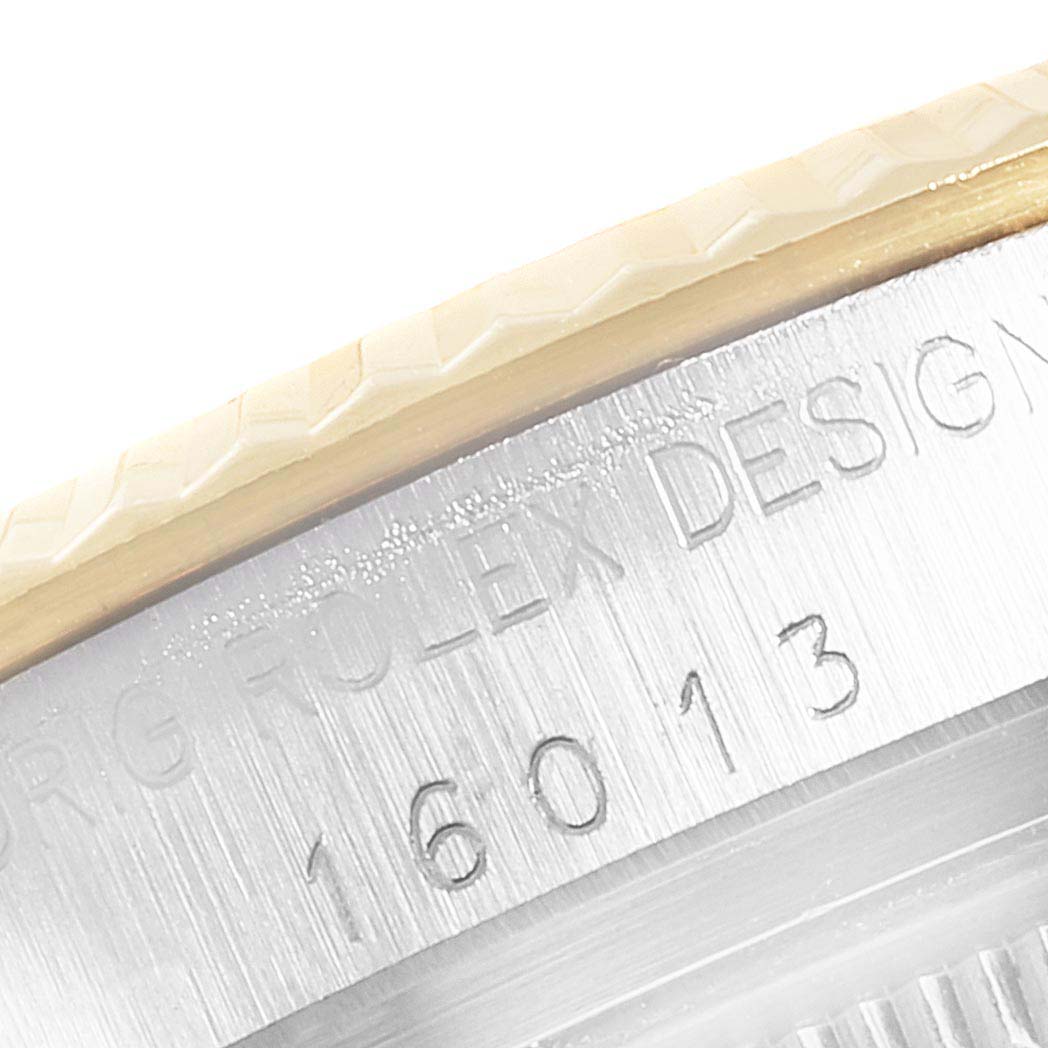 The image shows a close-up of the case side and bezel, detailing the serial number of the Rolex Vintage Collection 16013 Men's Steel and Gold (two tone) Champagne Dial 16013 Men's Steel and Gold (two tone) Champagne Dial model.